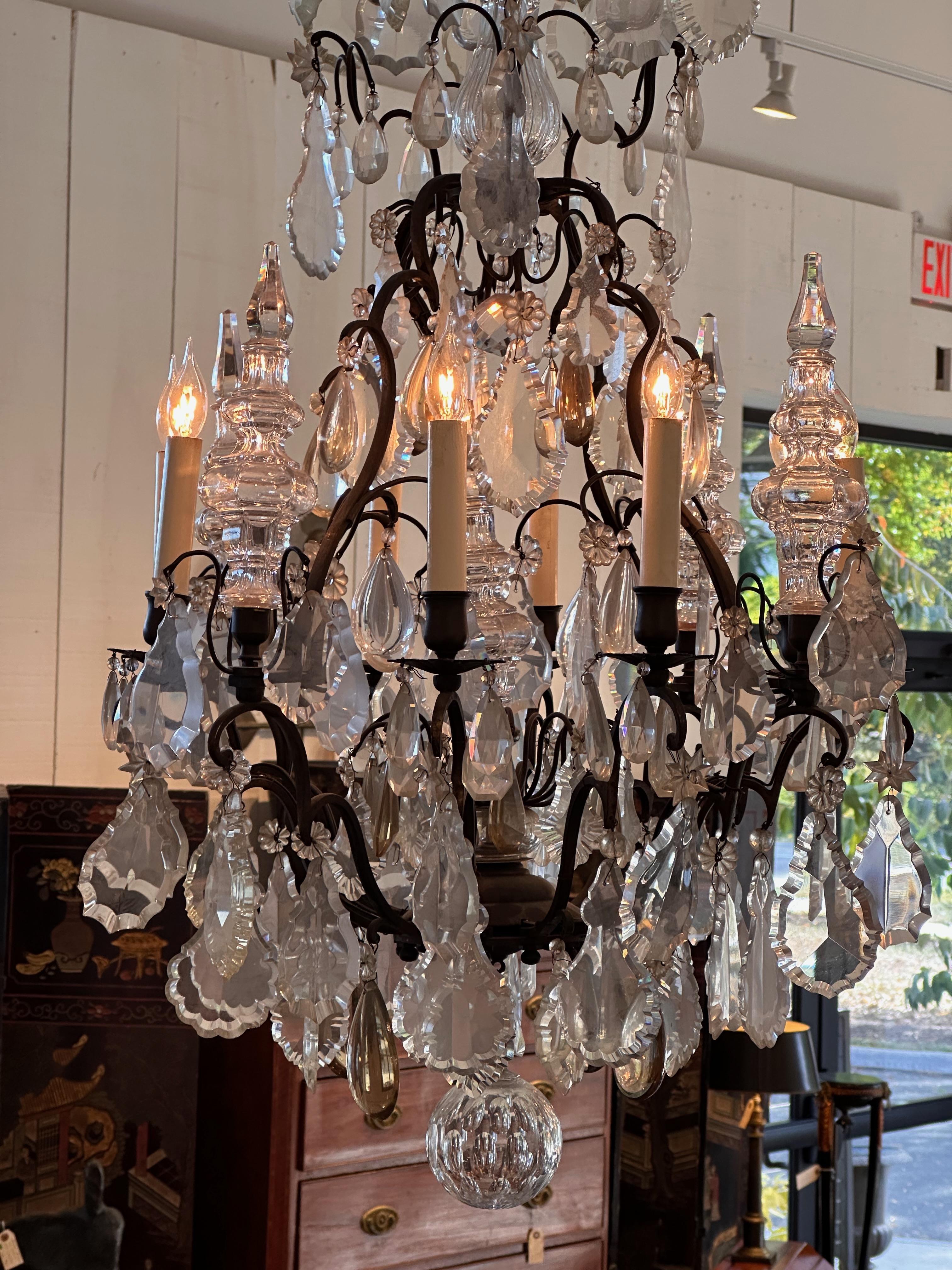 Bronze and crystal chandelier. Very elegant. Made in the 1950s. In Good Condition For Sale In Charlottesville, VA