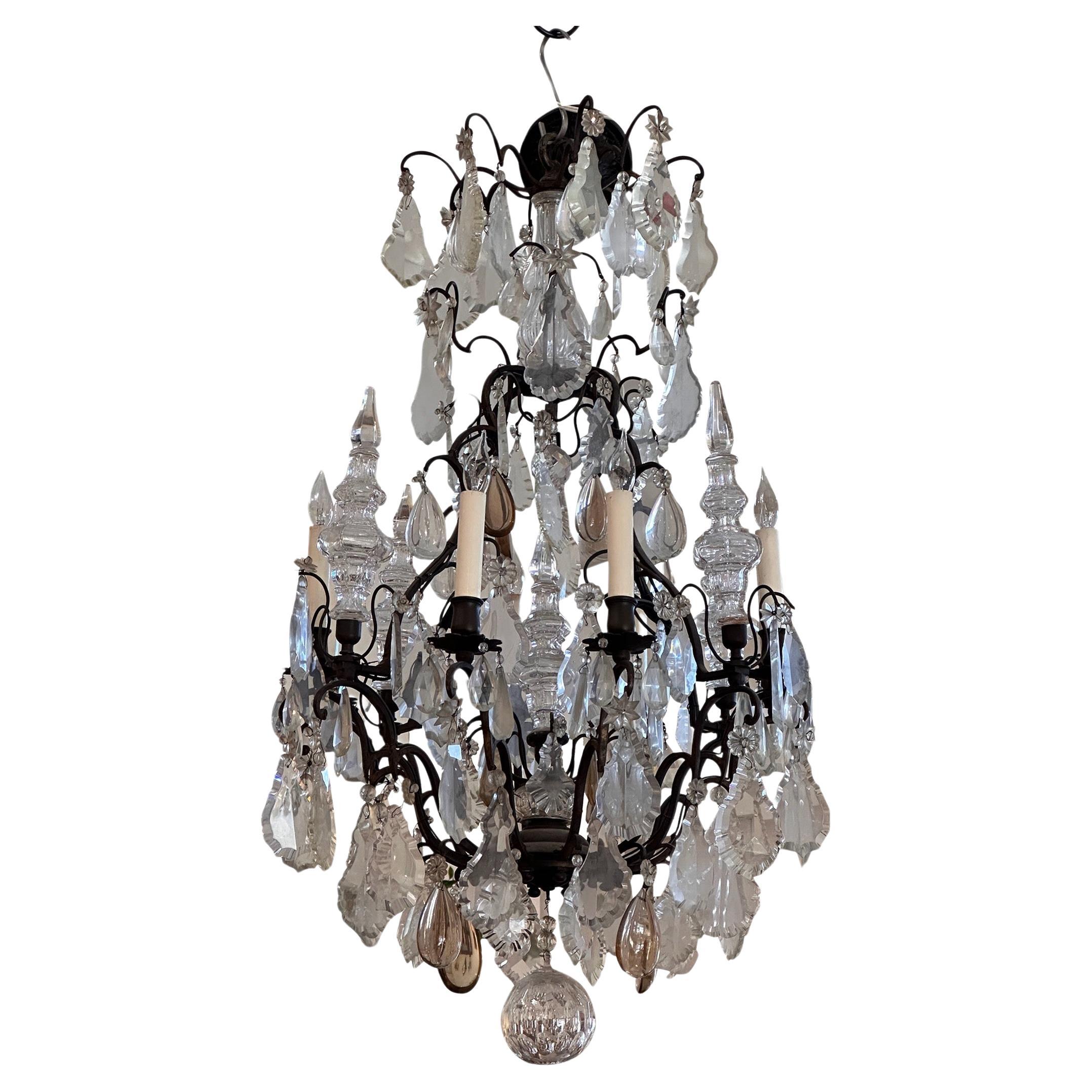 Bronze and crystal chandelier. Very elegant. Made in the 1950s.