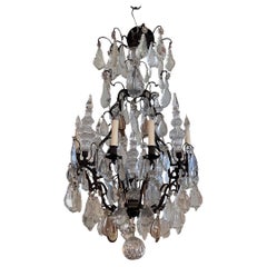 Bronze and crystal chandelier. Very elegant. Made in the 1950s.
