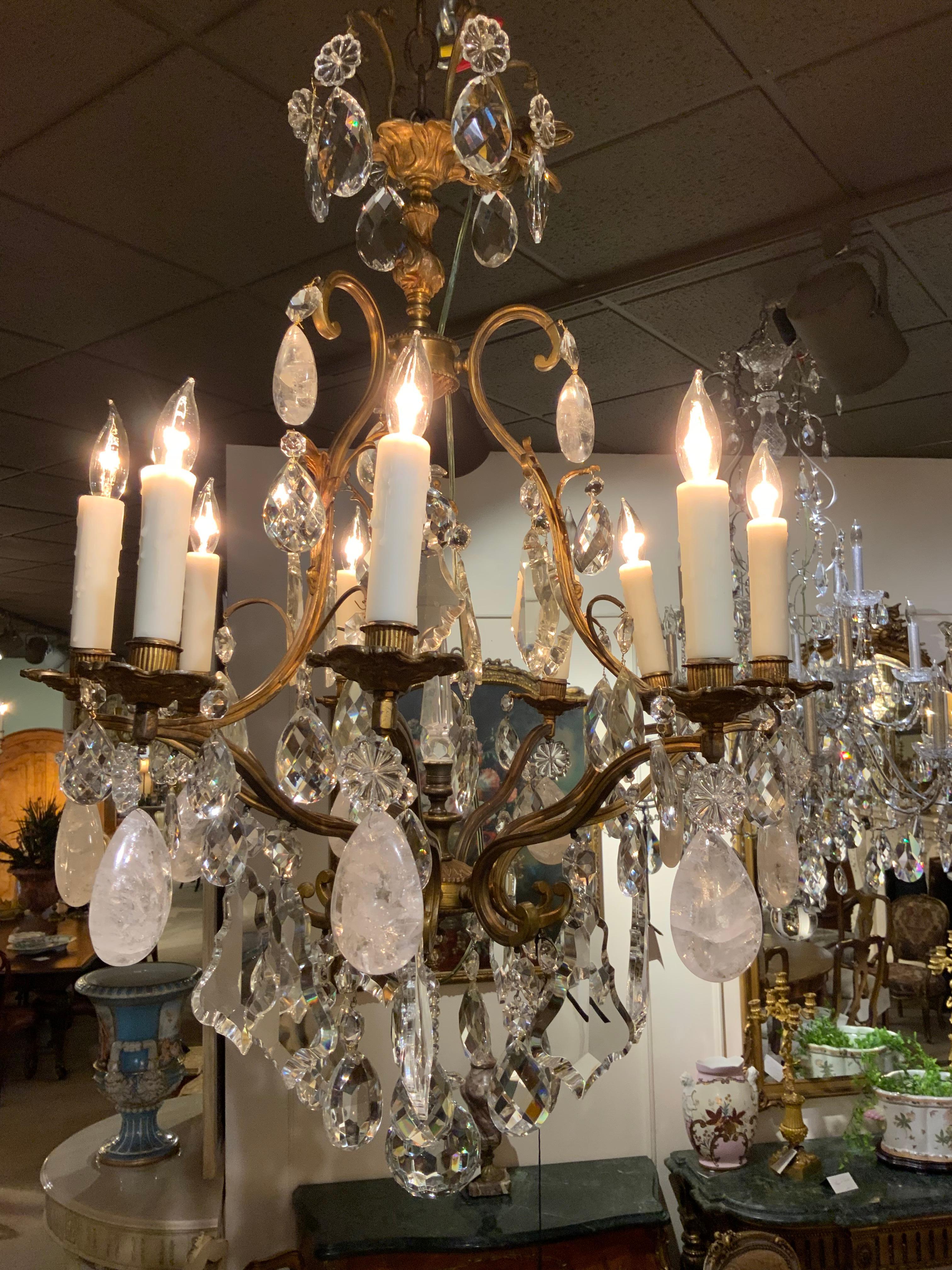 Bronze and Crystal Nine Light Chandelier with Scrolling Arms and Rock Crystals In Good Condition For Sale In Houston, TX