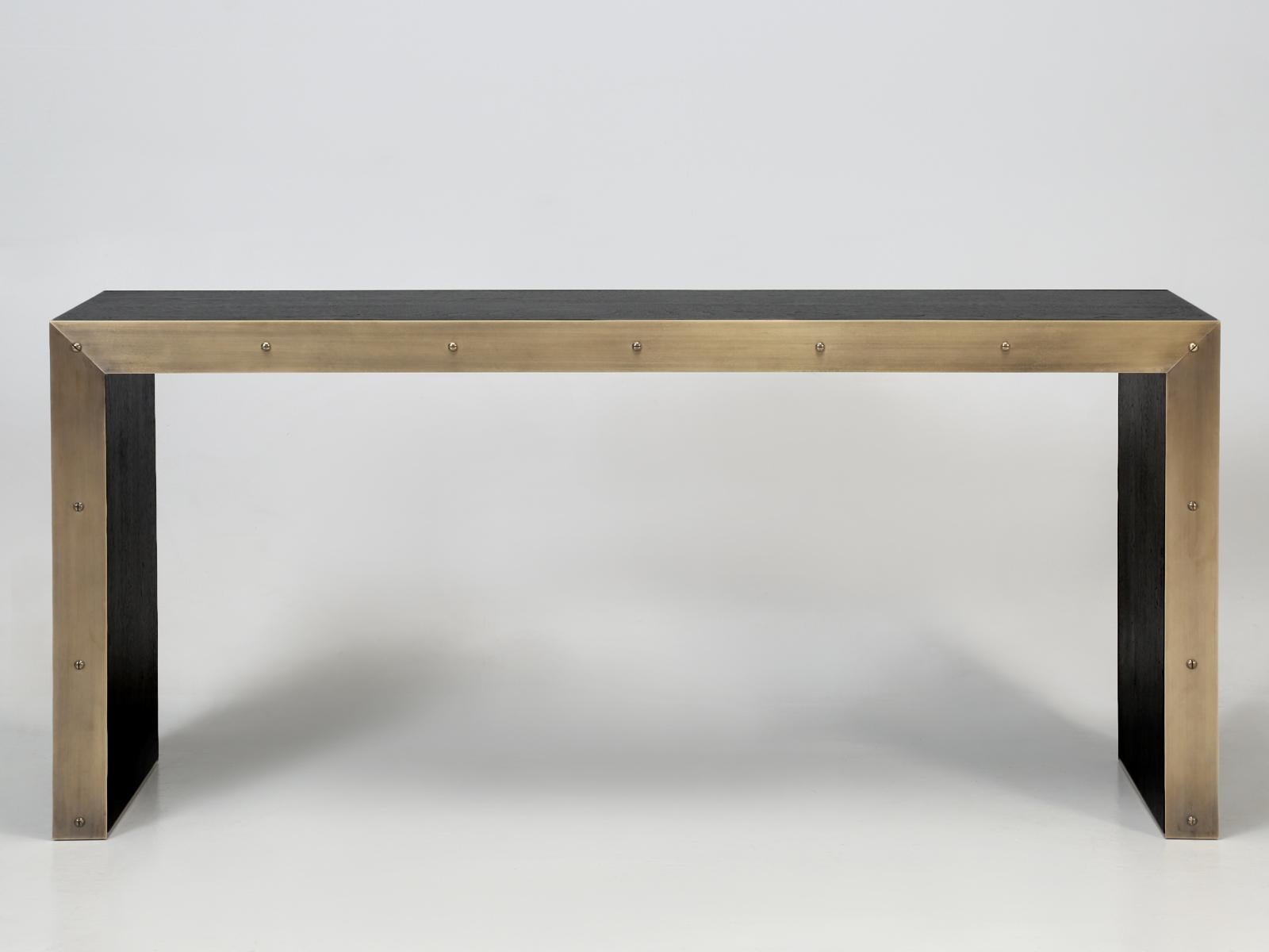 From the Old Plank collection, a solid bronze and ebonized walnut (optional mahogany) console or sofa table, built to your unique specifications. Whether it is a dimensional or finish change, virtually anything is possible. As with any of our