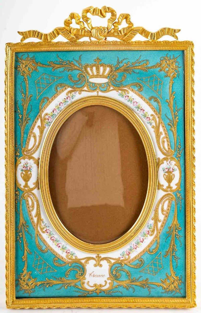 Bronze and enamel photo frame, late 19th century
Gilt bronze and enamel photo frame, Napoleon III period, 19th century.
    