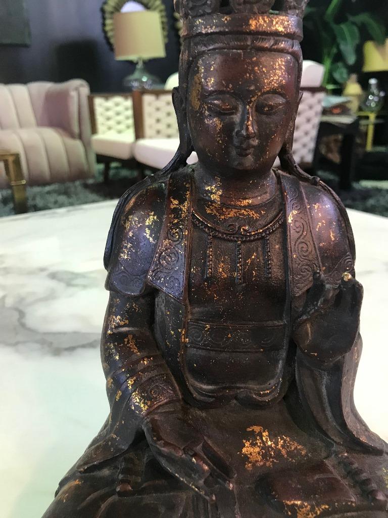 This is a fantastic piece. Likely Chinese. Perhaps part of a family shrine at one time. Beautiful faded gilt coloring and shine that comes with handling and age.

We are listing as 20th century but could be older.

The piece is hollowed in the