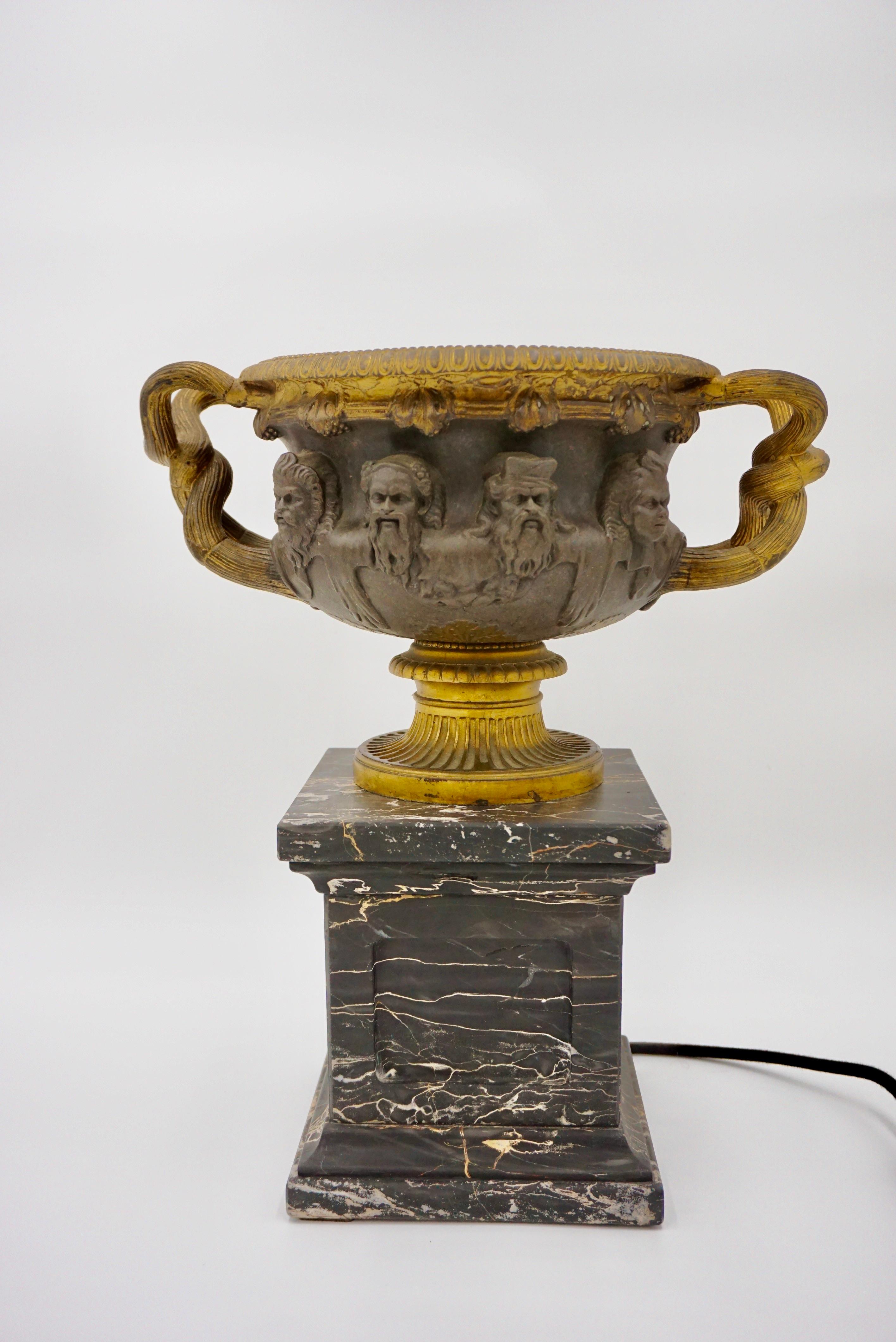 Large gilted bronze 'Warwick' vase lamp by Barbedienne, Paris circa 1860 mounted on a portoro marble pedestal.
fine and original patina 
led lamp 4w 230V
measures: 35 X 23 cm, Height: 39cm; the vase: 35 x 23cm height: 20cm; the pedestal marble:17