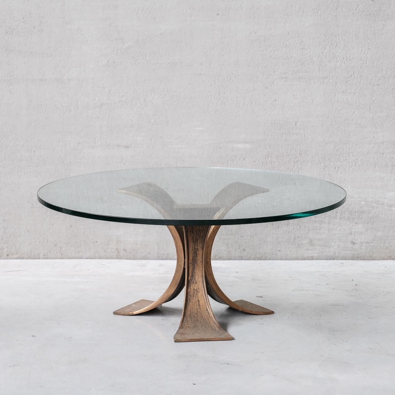 A bronze, splayed coffee table with thick circular glass top. 

Belgium, c1970s. 

Two available, PRICED AND SOLD INDIVIDUALLY. 

Good condition.

Location: Belgium Gallery.

Dimensions: 48 H x 110 Diameter in cm.

Delivery: POA

We