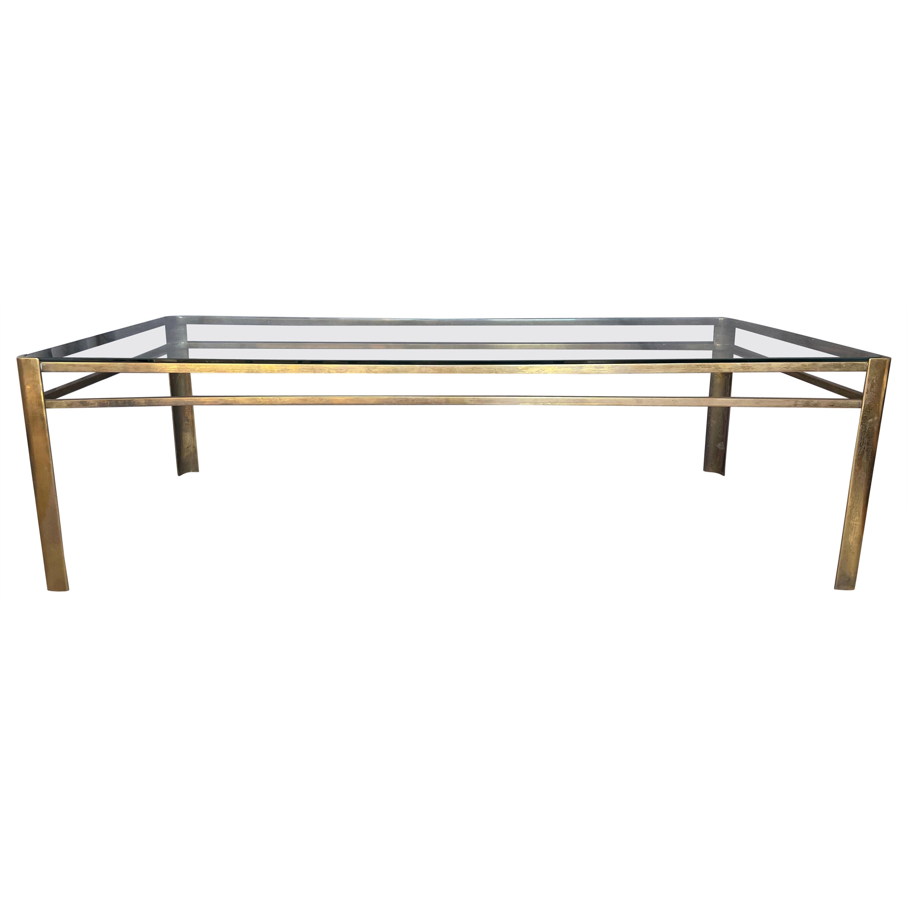 Table basse en bronze et verre de Jacques Quinet pour Maison Malabert
