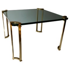 Mesa auxiliar de bronce y cristal