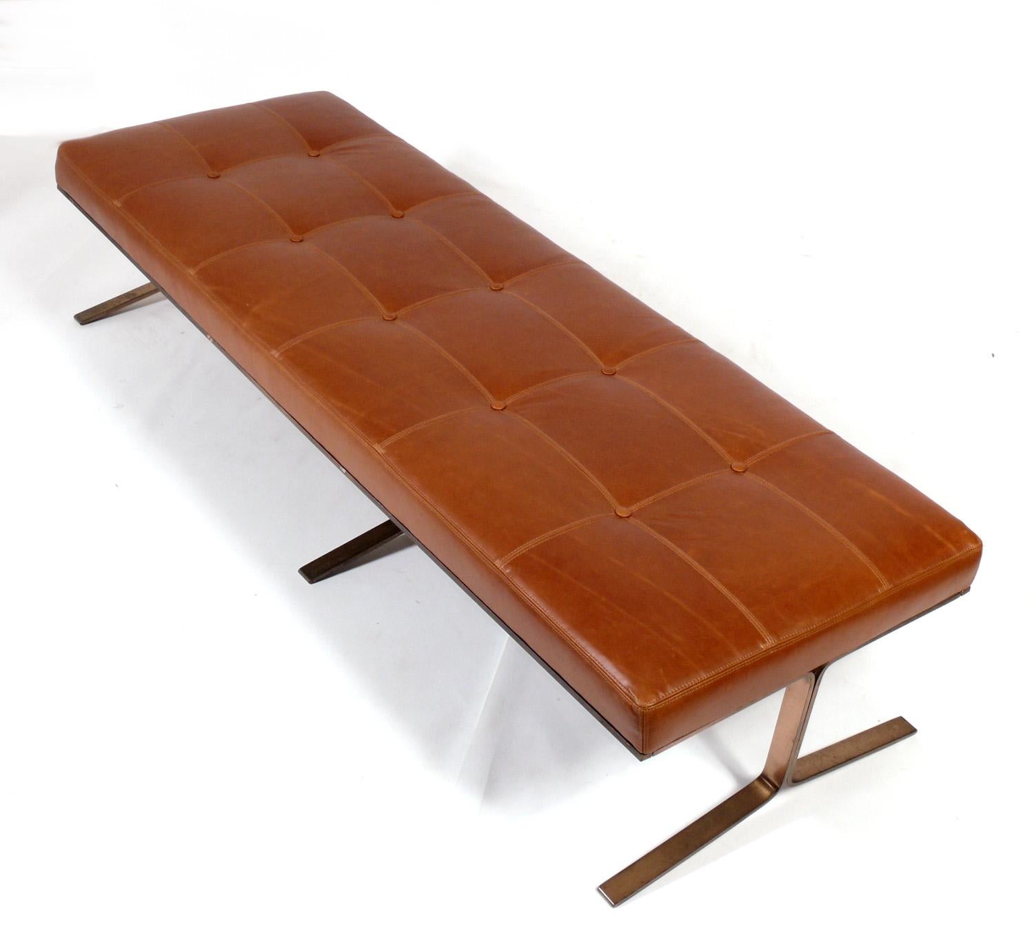 Bronze and caramel color leather daybed or bench, designed by Nicos Zographos, American, circa 1960s. Retains warm original patina to the bronze.