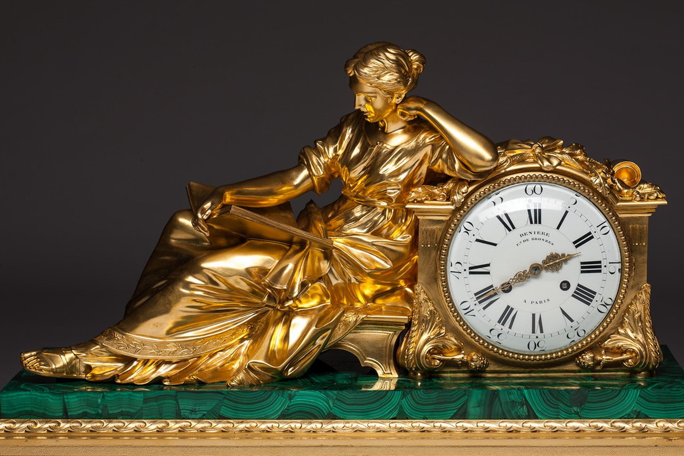 Very large clock signed Jean-François Deniere (1774-1866). Manufacture in Paris. The sculpture on the malachite base is Madame Geoffrin. This clock model known as the Geoffrin pendulum. Made of green malachite stone and very quality gilded bronze.