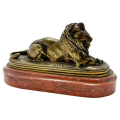 Bronze and marble lion figure by PAUL ÈDUARD DELABRIÉRRE "Reclining lion"