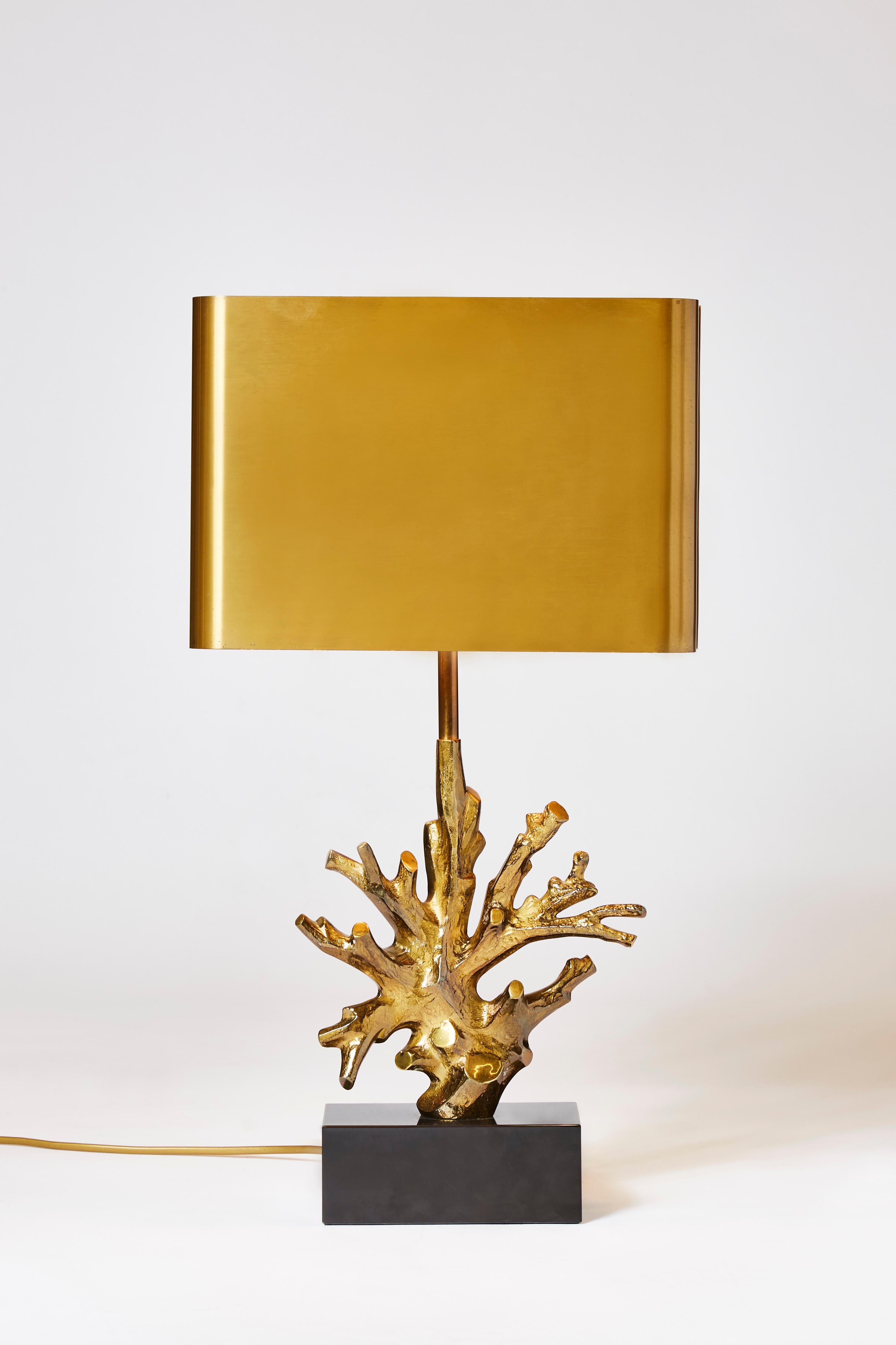 Elegant and refined table lamp by Maison Charles, black marble foot with the bronze coral and matching brass original shade.