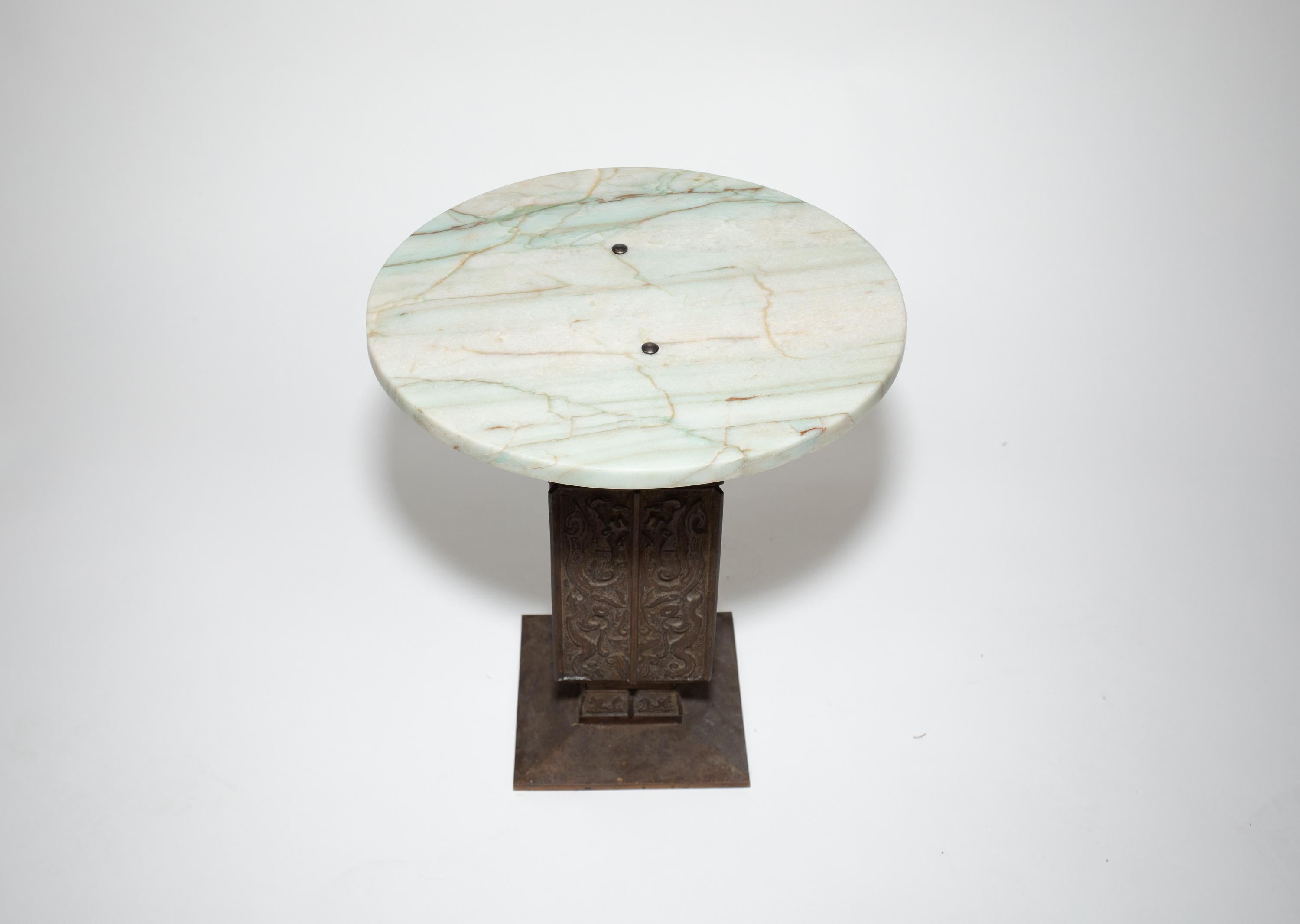 Heavy Bronze and Marble diminutive tables
Bases sculpted with modern chinoiserie decoration