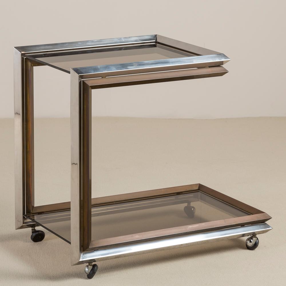 A two-tiered bronze and nickel double framed bar cart on castors with smoked glass late 1970s
