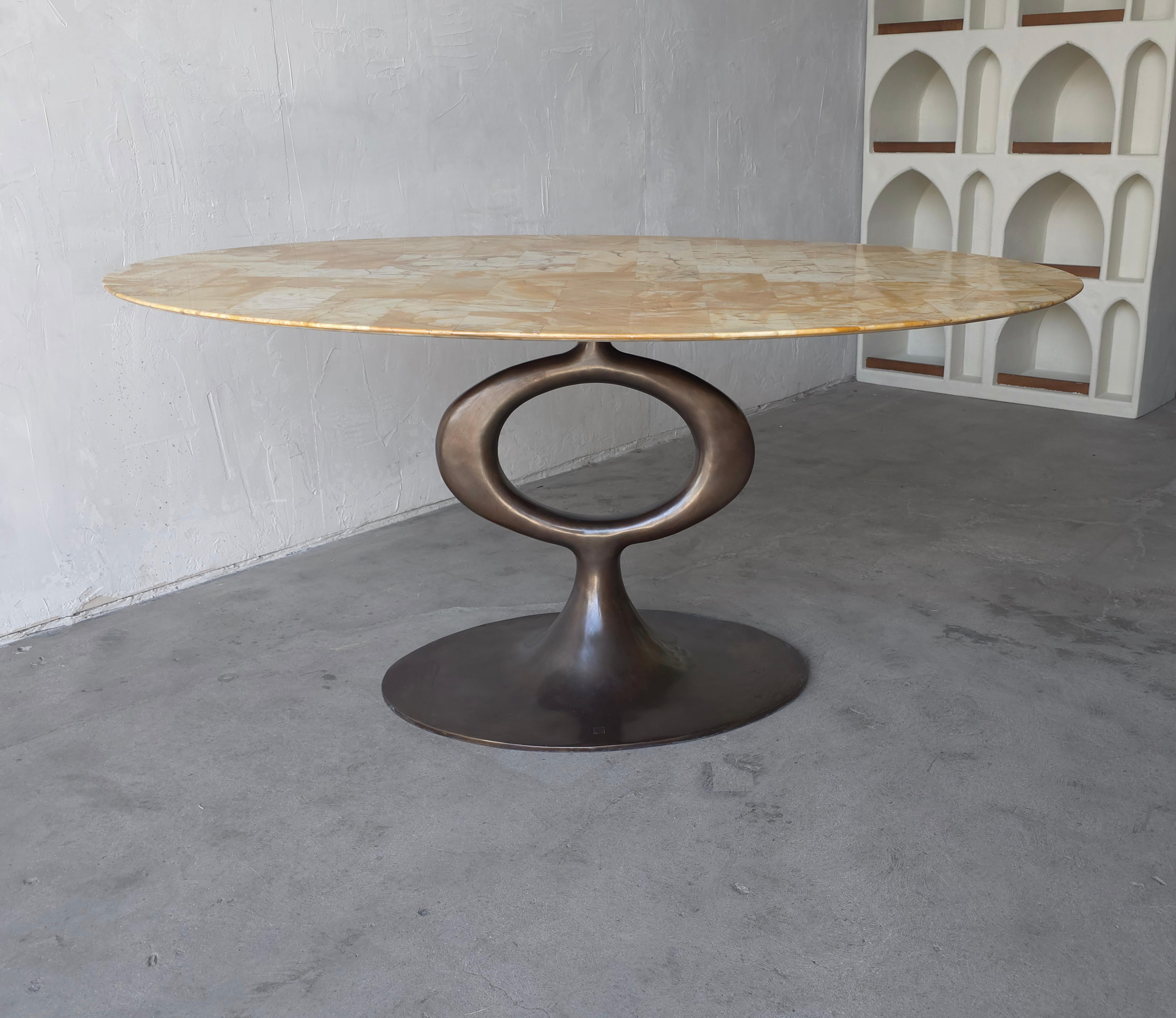 The gorgeous Ellipse dining table is by the renowned Blackman Cruz in Los Angeles.  Their incredible custom pieces are designed and manufactured in limited quantities, by local artisans. Each piece in the collection is individually crafted with