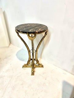 Bronze noir et or  Guéridon en marbre Portor de Jacques Duval Brasseur