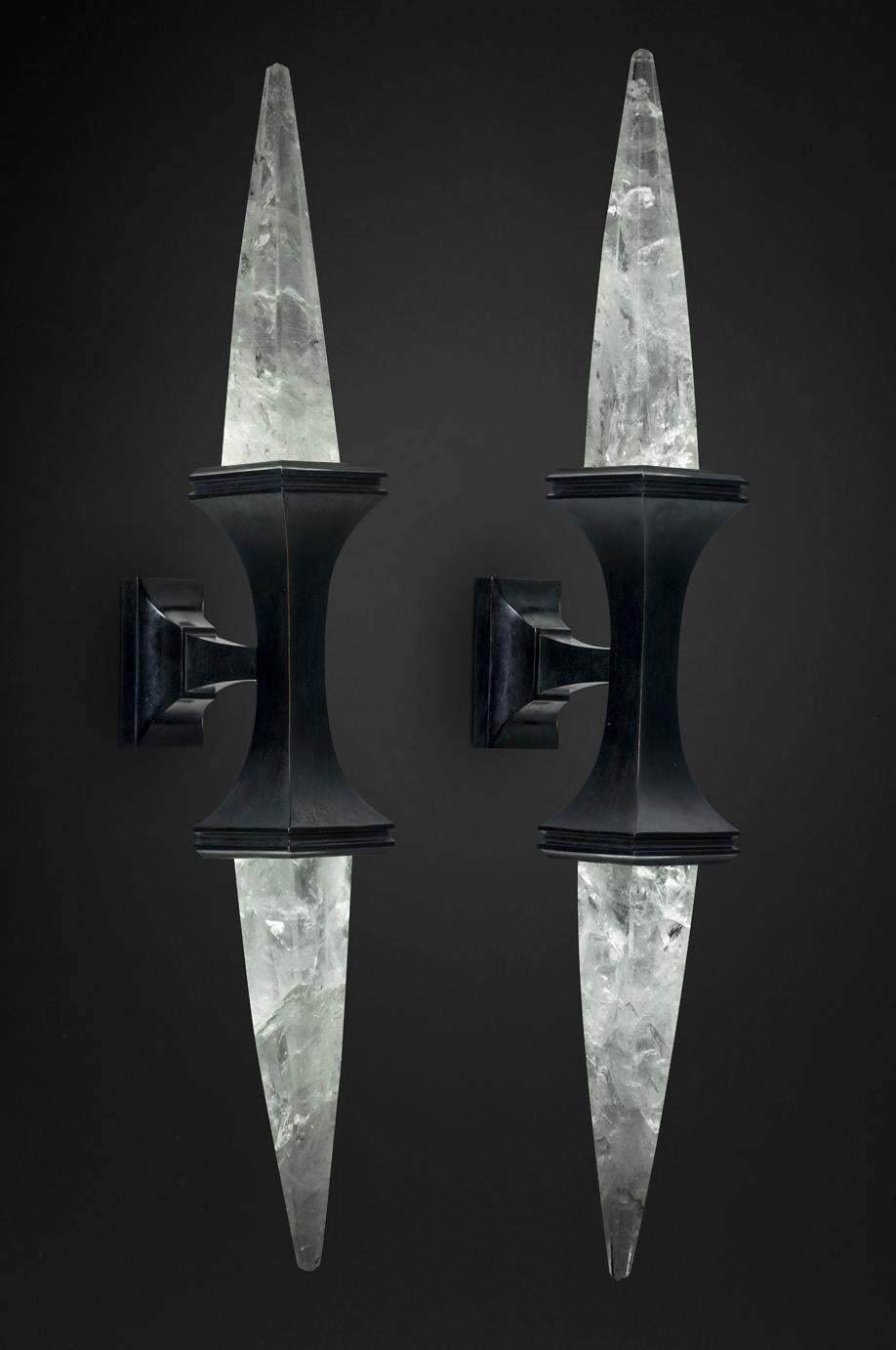 Rock crystal quartz wall light I, black edition.
These wall sconces are handmade in bronze in Paris.
Each workers who made this wall sconce belongs to a corporation and worked also for the most famous French companies (Haute Couture and