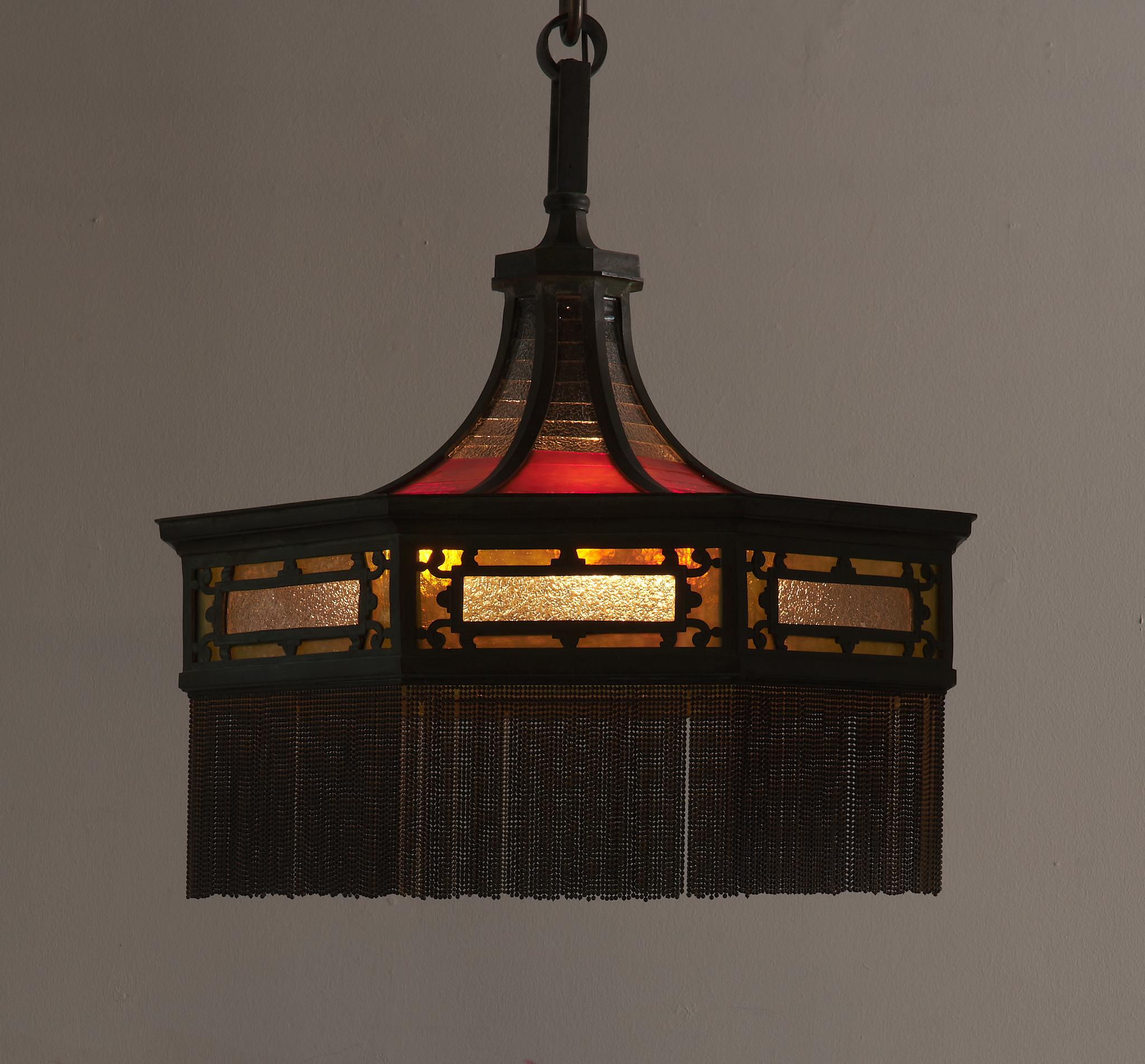 This fixture is in spectacular condition. It’s only missing a few pieces of hanging ornamental chain.  All of the stained glass is intact and the colors of the glass are enchanting.