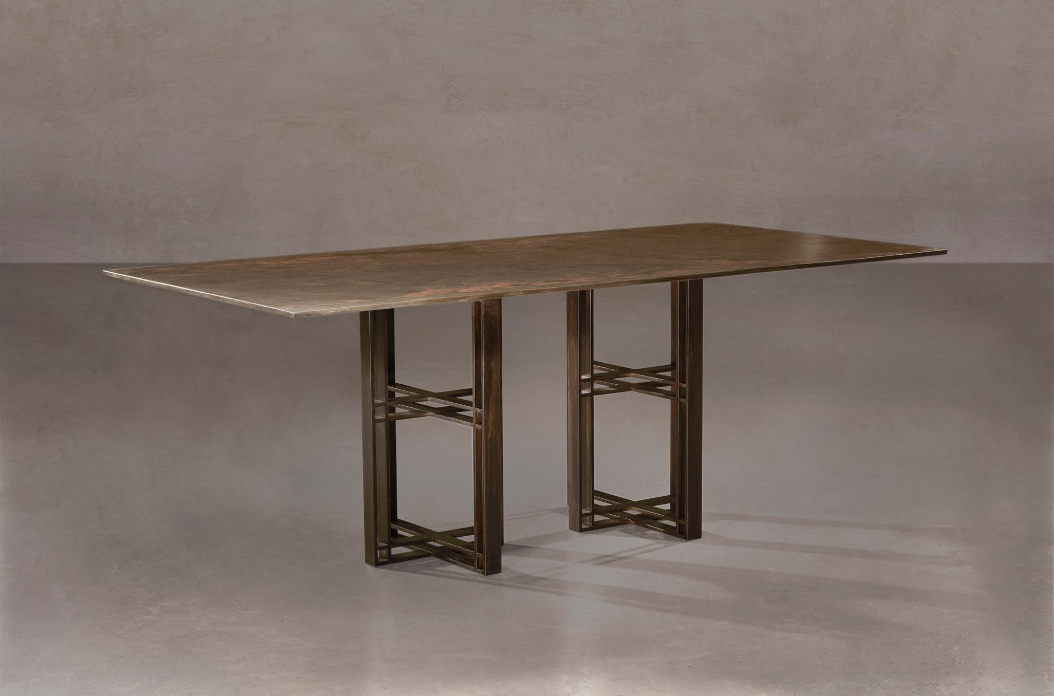 Athwart Bronze and steel dining table handcrafted and signed by Novocastrian
Materials: Patinated Brass top and base
Measures: 200cm (width) x 75cm (height) x 100cm (depth).
Custom sizes available. Available with marble or timber top.
Dining table