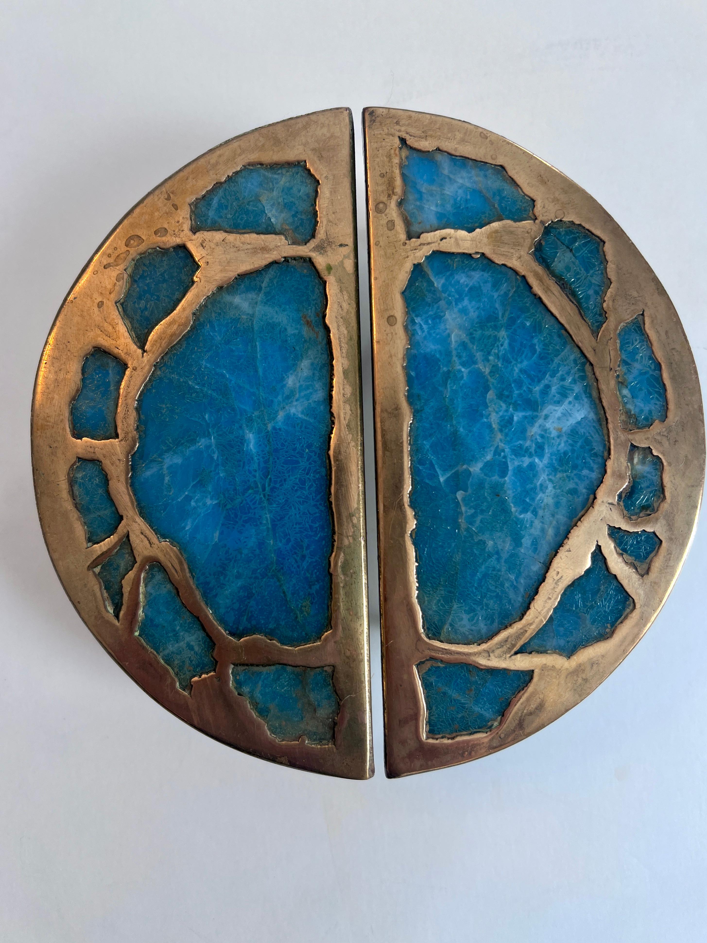 A wonderful pair of hand=crafted bronze and stone pulls by Mexican artisan Pepe Mendoza.  The pair come together to create a 6