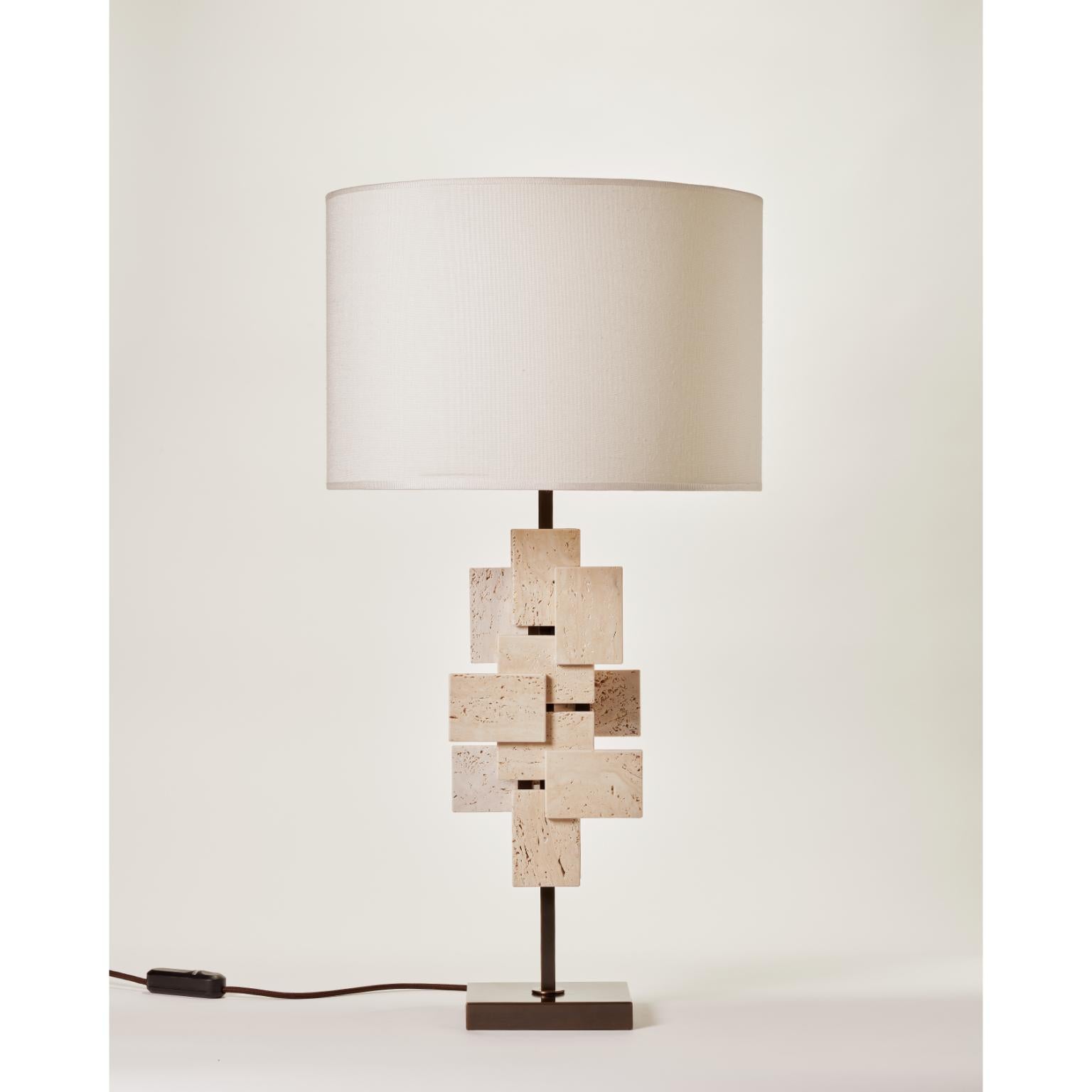 Bronze And Travertine Marble Tiles Table Lamp by MATLIGHT Milano
Dimensions: D 45 x W 45 x H 85 cm.
Materials: Bronze and Travertine marble.

Handmade In Italy. All our lamps can be wired according to each country. If sold to the USA, it will be