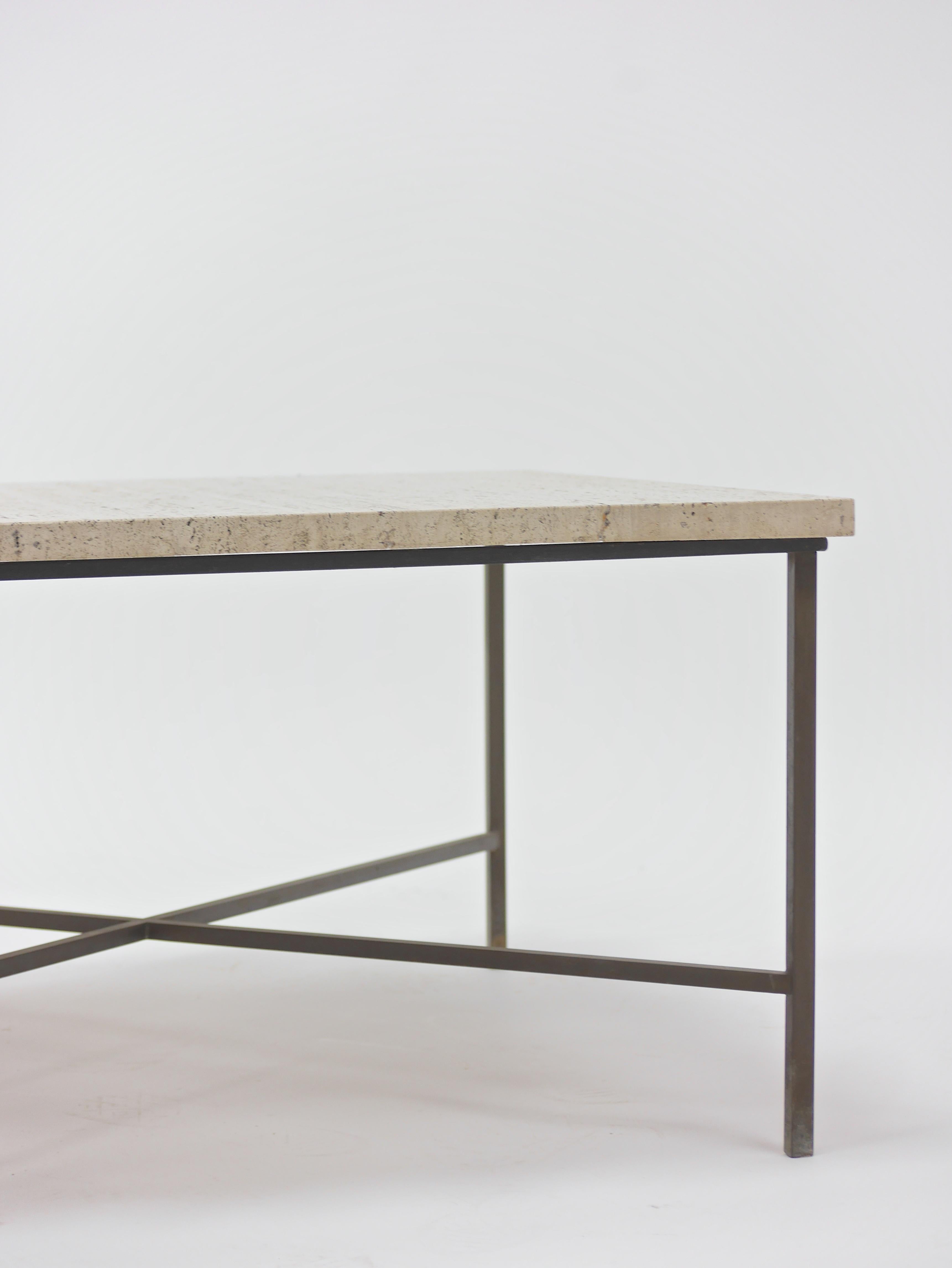 Bronze and travertine table by Harvey Probber. Solid bronze frame with a nice original Verde Gris patina.