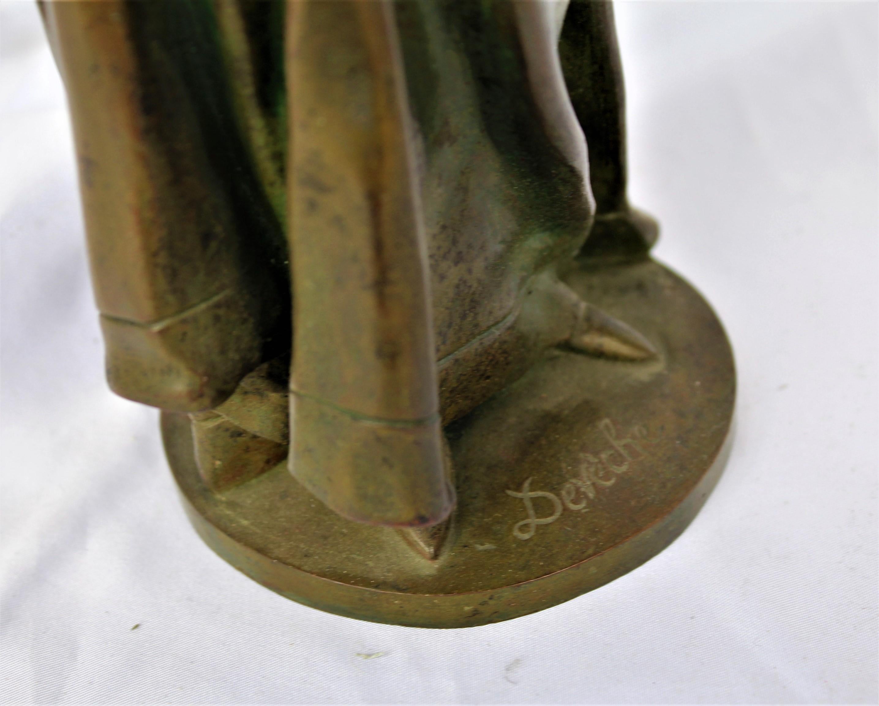 Graceful lady holding a book. Great Patina finish, signed by the artist in (Art Nouveau design) has artist signature on the base plate (Deve'che) from circa 1890s. Held in a private collection of bronzes. Has very fine details and age to it. Well