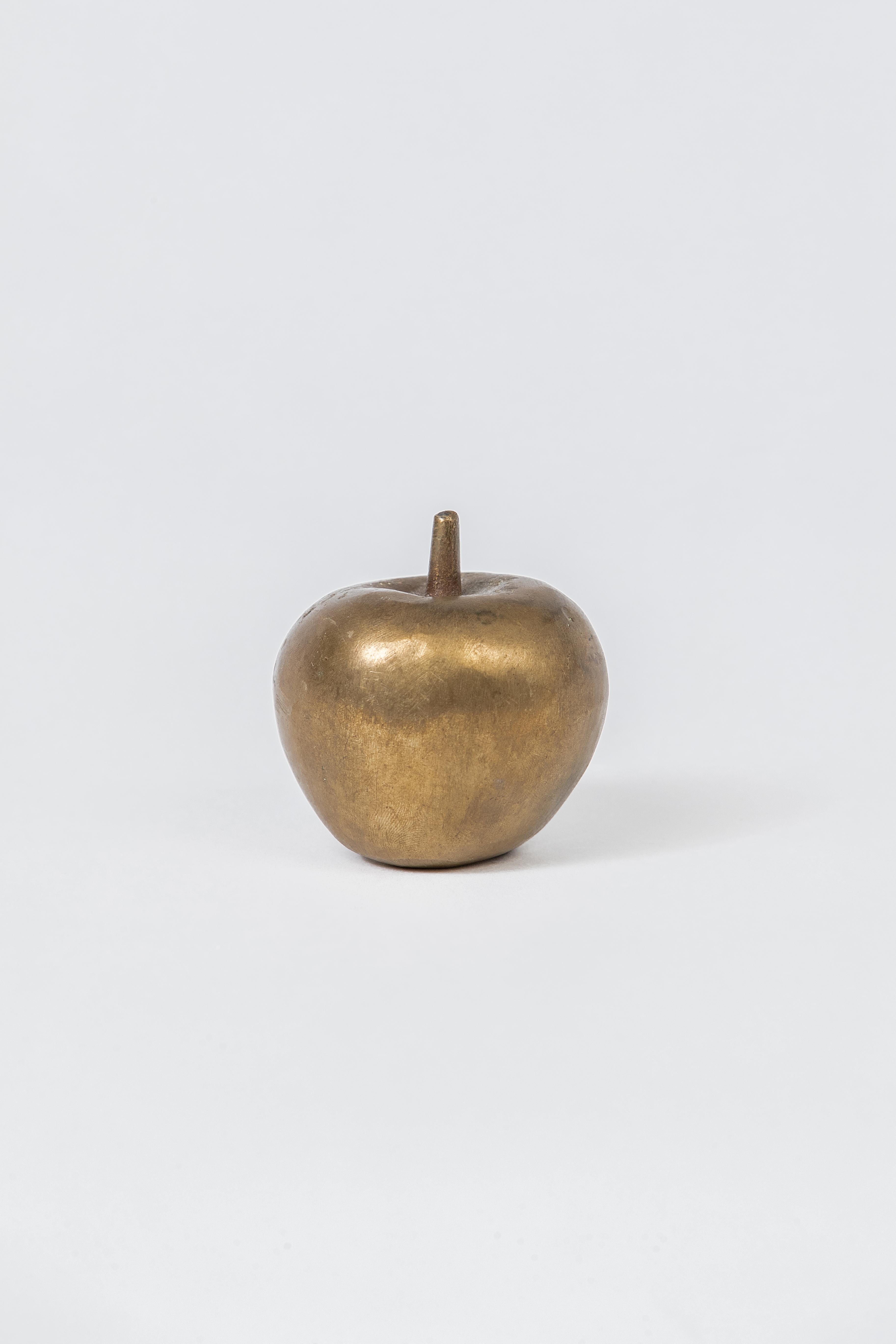 A little bronze Apple paperweight using the lost wax process.
