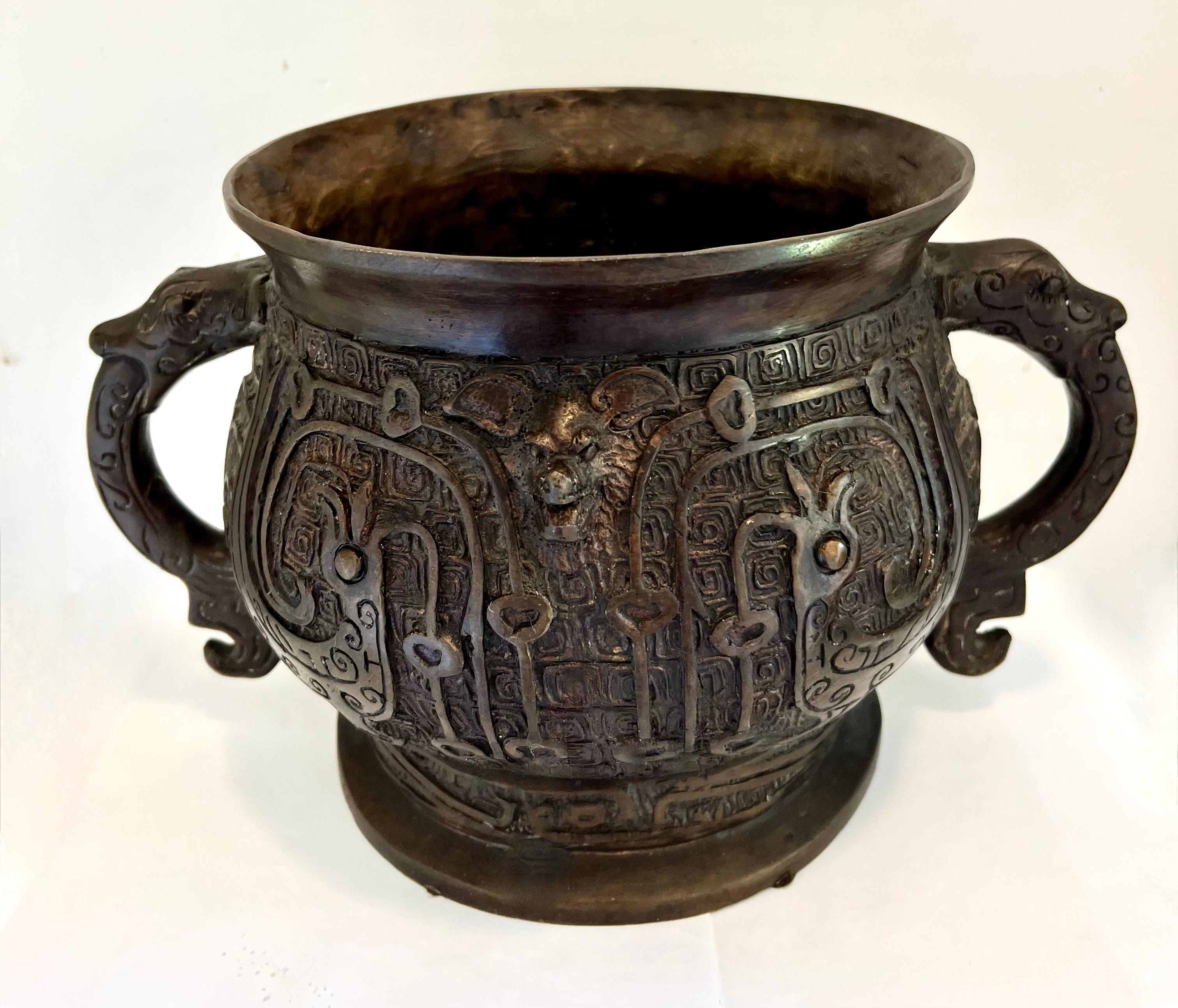 Cast Bronze Archaic Chinese Ritual Vessel with Handles For Sale