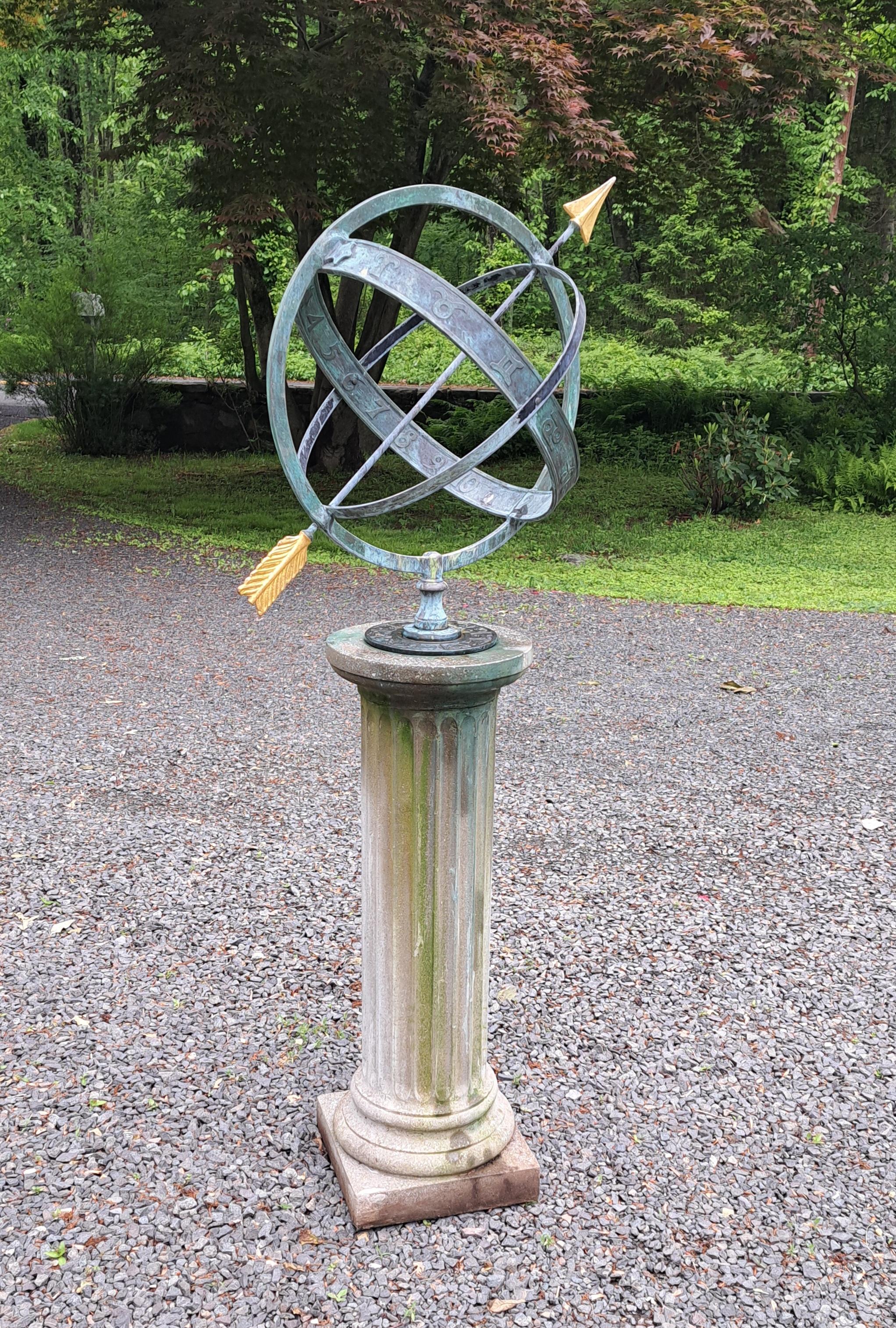 Bronze Armillary Sphere on a Cast Stone Base.  Together it is 60