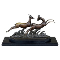 Base in bronzo Art Deco 1930 in marmo nero con gazzelle di Alliot