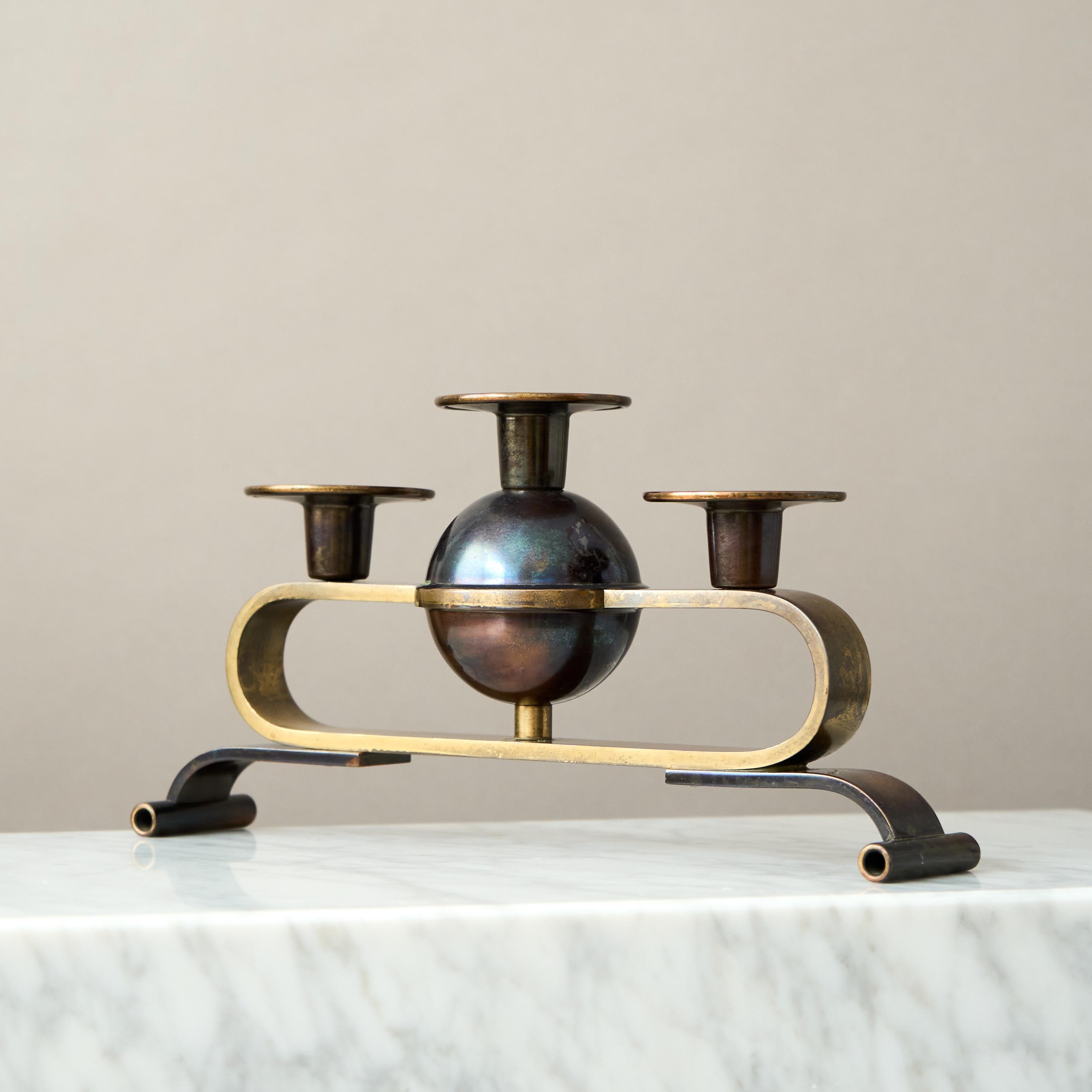 A beautiful Art Deco bronze candelabra with amazing patina. 
Made in Sweden, 1930s, by an unknown designer and manufacturer. 

Great original condition, with some wear to the patination and light scratches.

