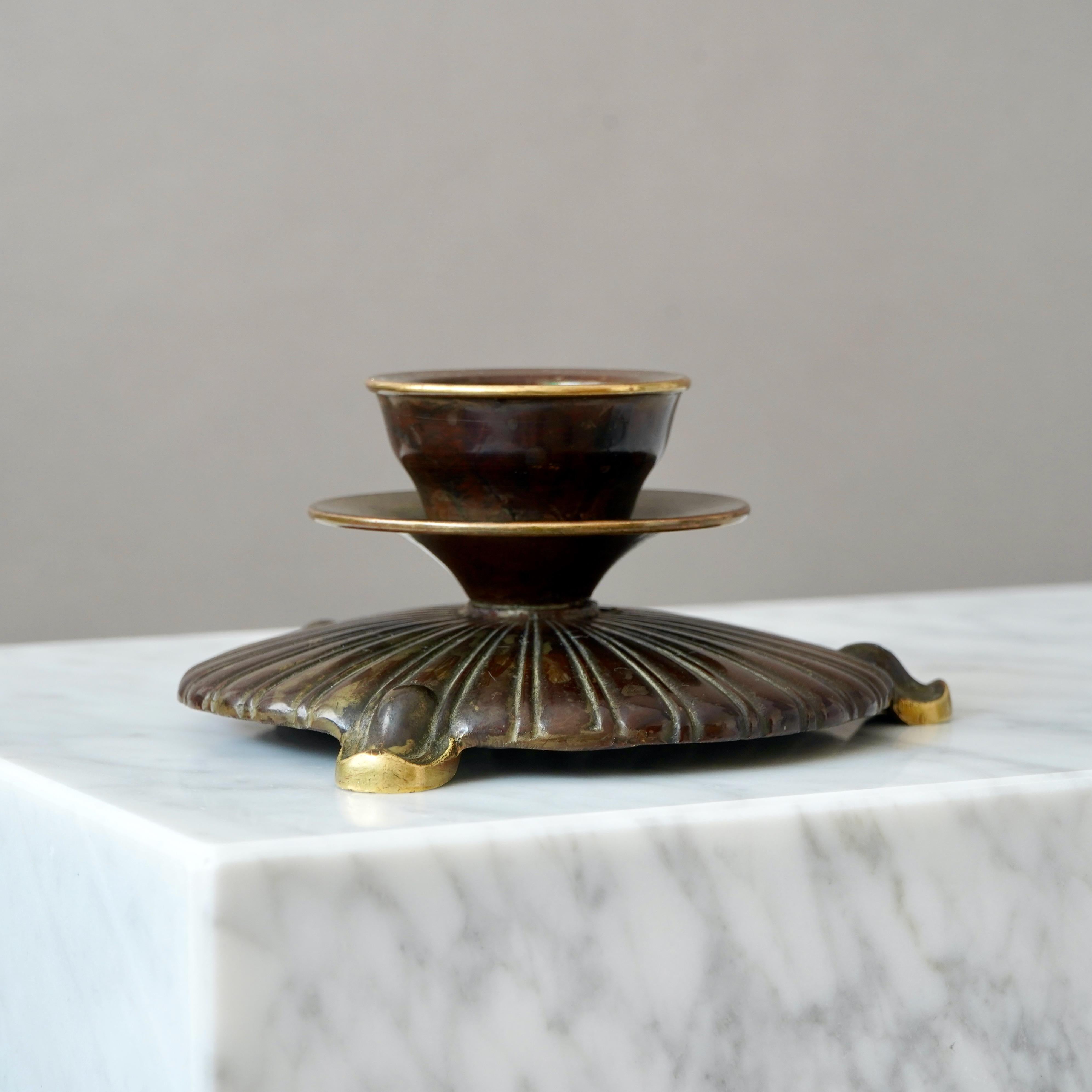 A bronze Art Deco candlestick with amazing patina. 
Made by H.F. Ægte Bronce, Denmark, 1930s.  

Good condition, only some light scratches.
Stamped with makers mark.