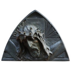 Sculpture murale en bronze de l'époque Art déco représentant le Christ avec la couronne d'épines:: Sylvain Norga