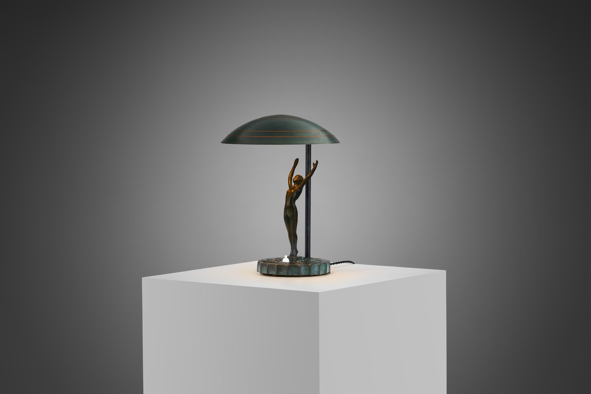 This Green Patinated Bronze Art Deco table lamp from the 1940s, possibly once labeled model 