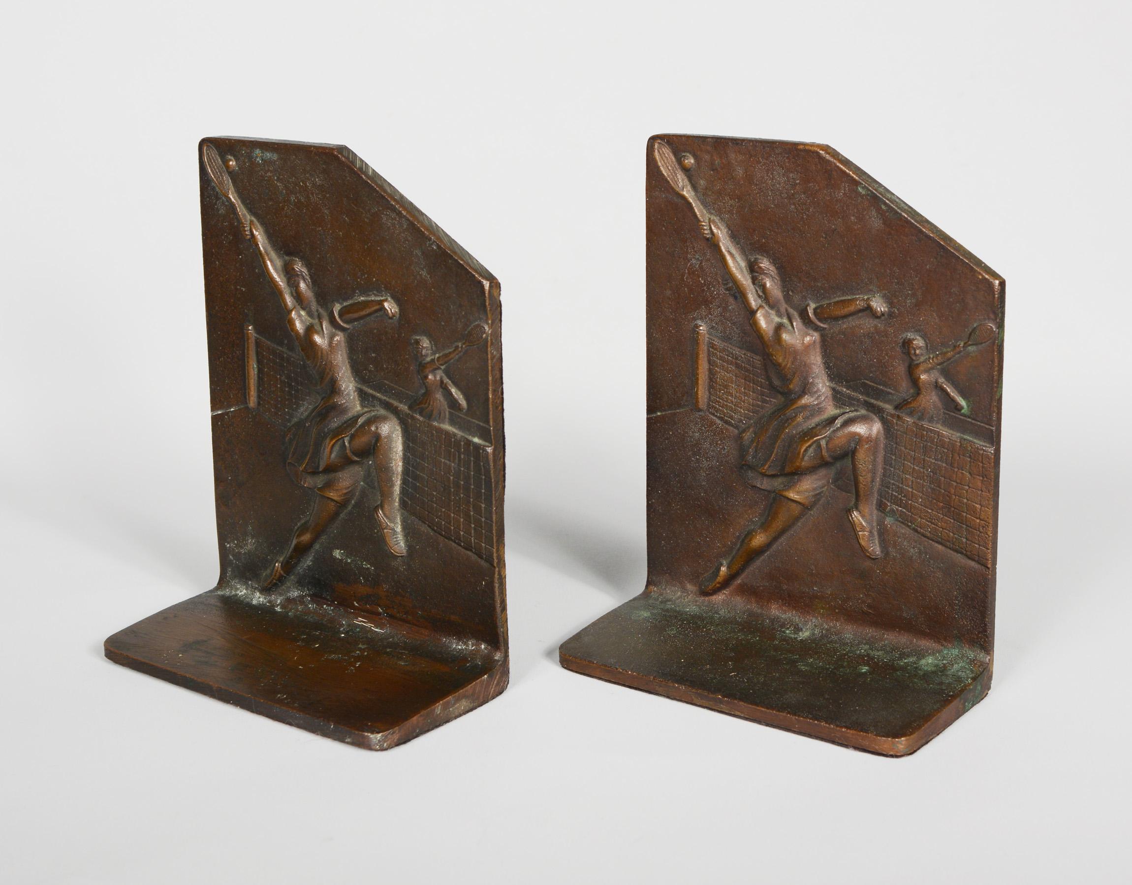 Pair of bronze bookends with women tennis players. These are not signed. They are tall making them good for larger books. There is a little oxidation in spots.