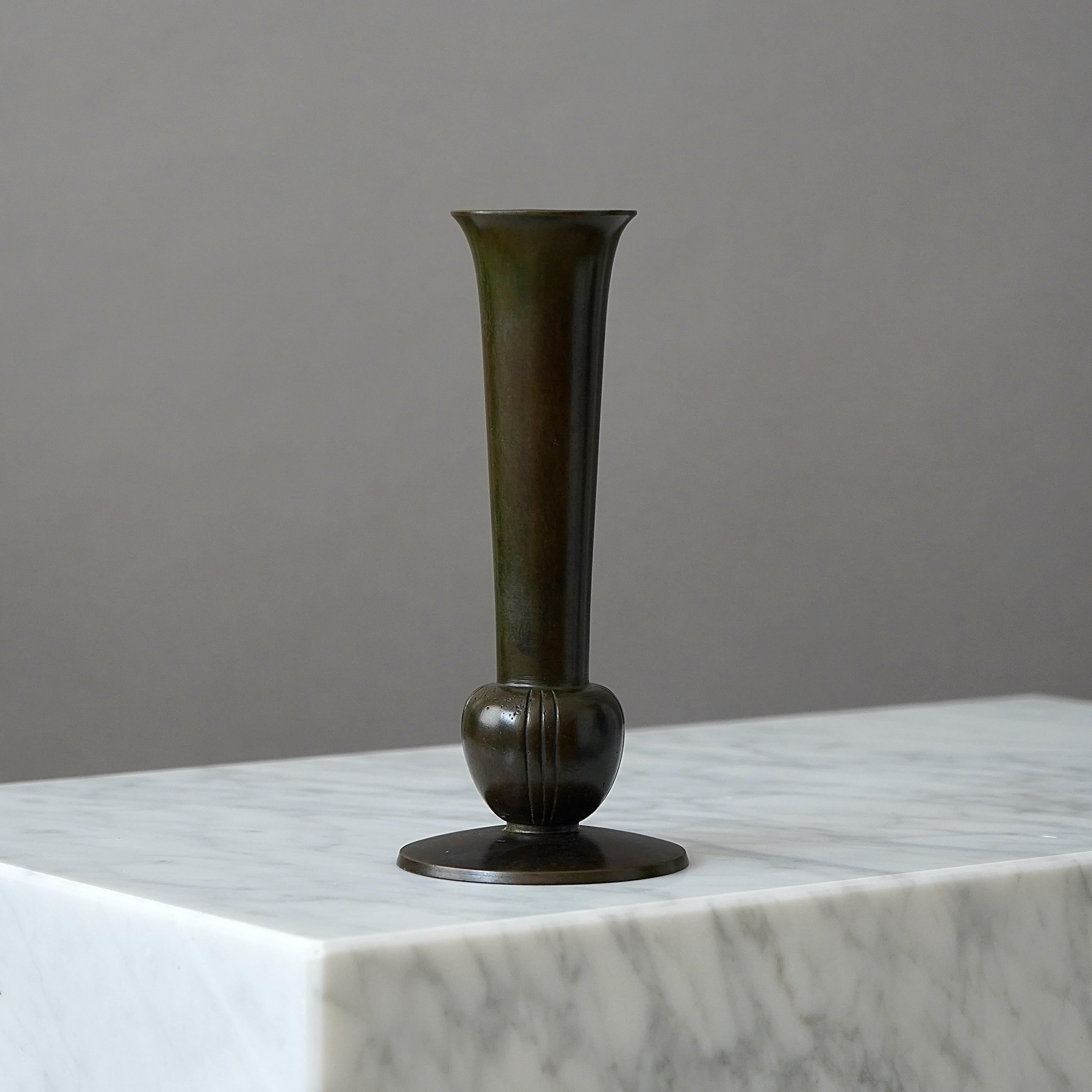 A beautiful bronze vase with amazing patina. 
Made by GAB Guldsmedsaktiebolaget, Sweden, 1930s.  

Great condition, with a few light scratches.
Stamped 'BRONS', model number '312' and makers mark.