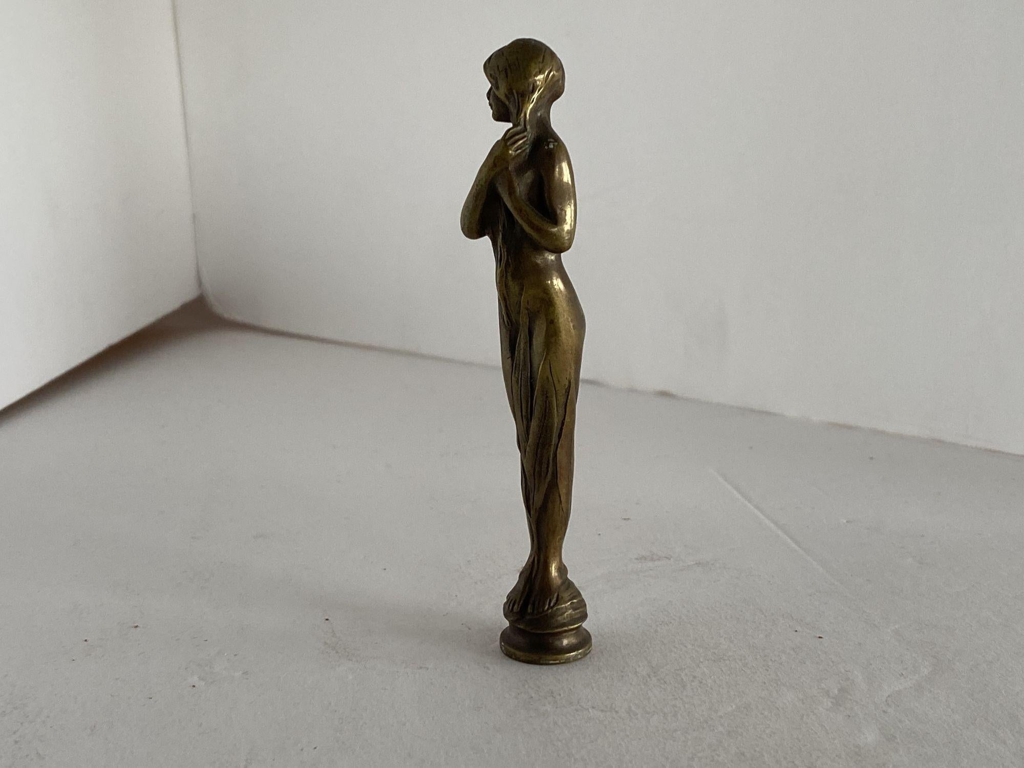 Late Victorian bronze Art Nouveau cloaked women letter wax seal stamp unused and never monogrammed.
 
Circa 1890.