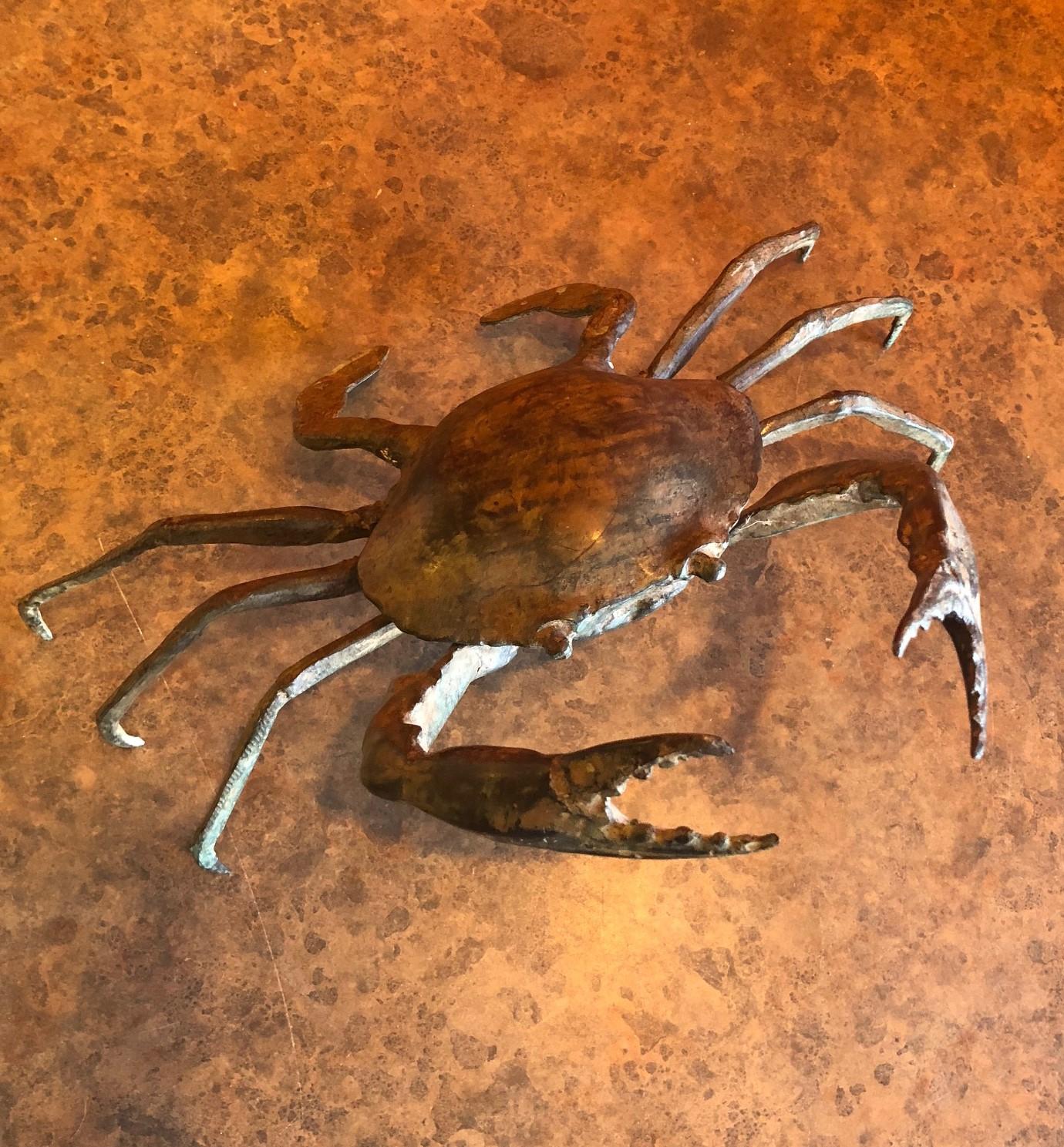A well detailed and patinated articulated bronze crab sculpture, circa 1970s. The piece has an Asian flair to it and may be vintage Chinese.