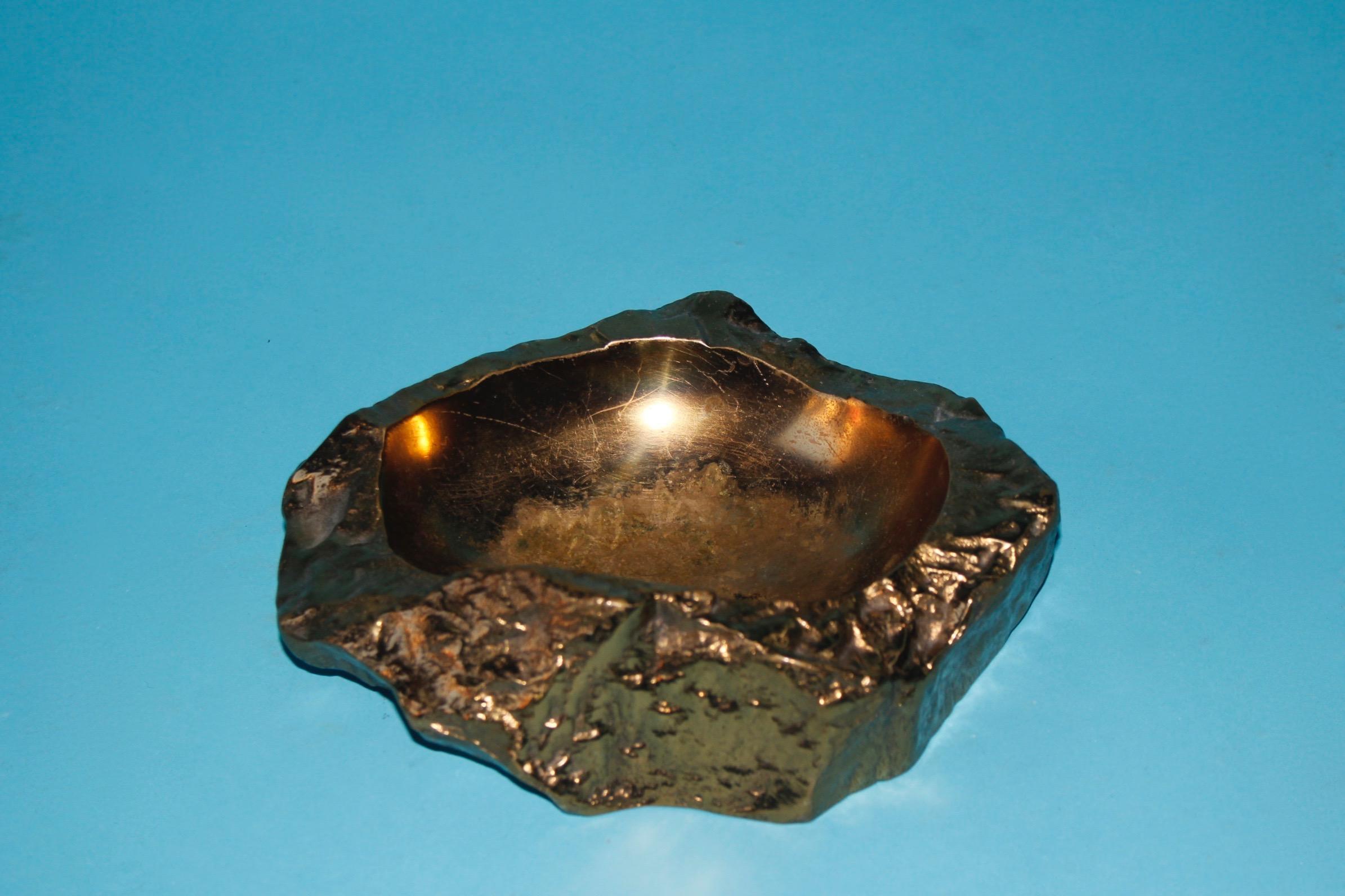 Bronze ashtray.