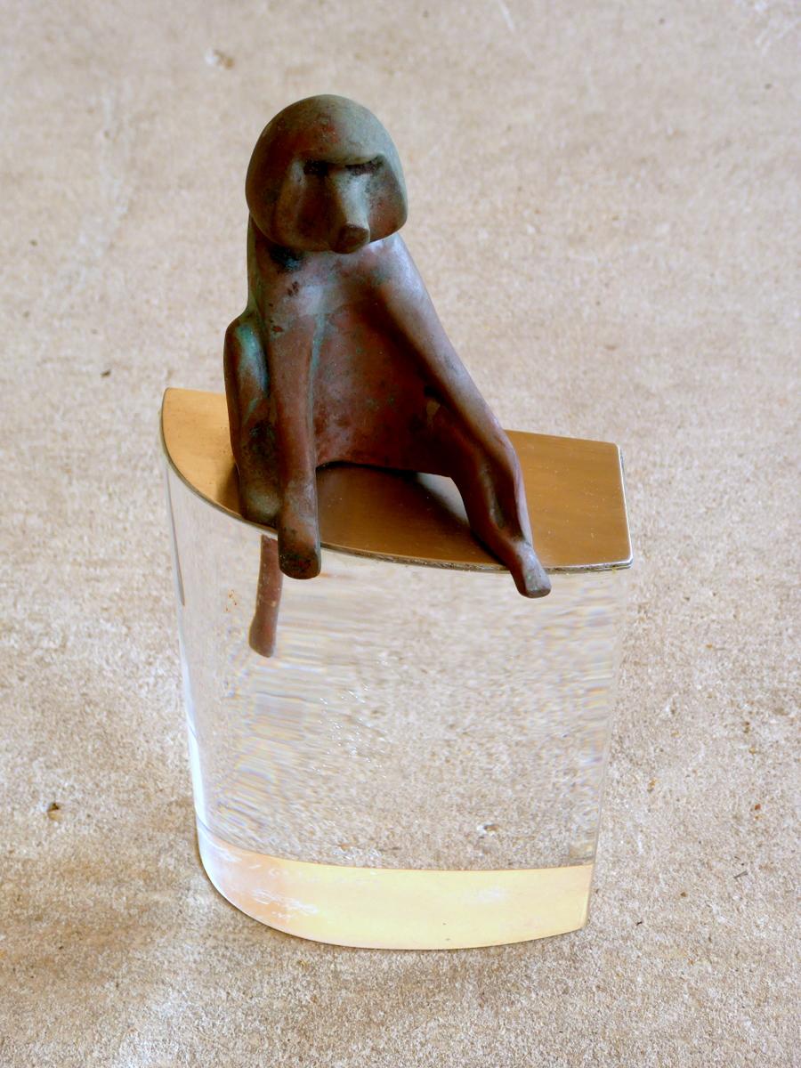An adorable depiction of a lounging baboon by Loet Vanderveen (Dutch, 1921-2015). No. 18 from a limited edition of 500. Solid bronze atop a stainless steel plate mounted on a Lucite base. Hand signed by the artist.

A few important notes about all