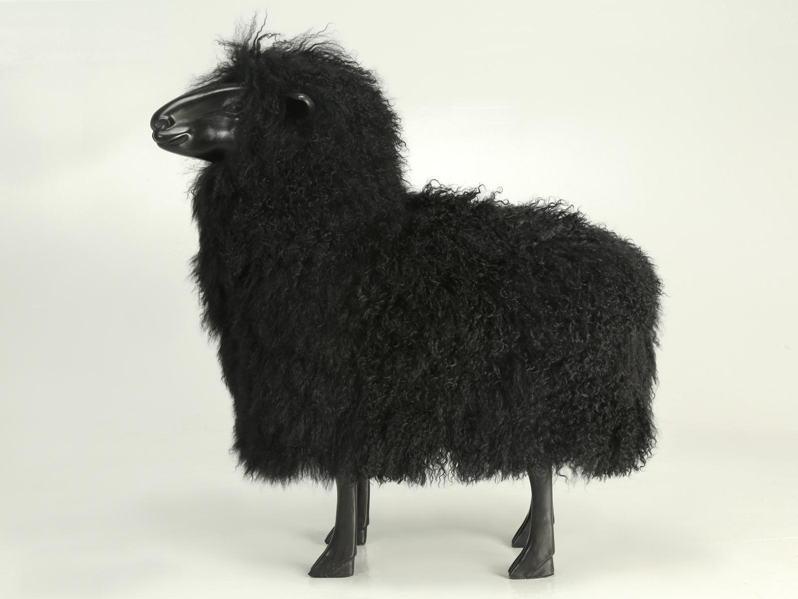 Baby Lamb that was made in America a few years ago and traded back in to us on a Large Sheep that we had in stock. The Baby Lamb was cast from Bronze and is covered in black faux Fur. Beautifully made with high quality Bronze castings that are