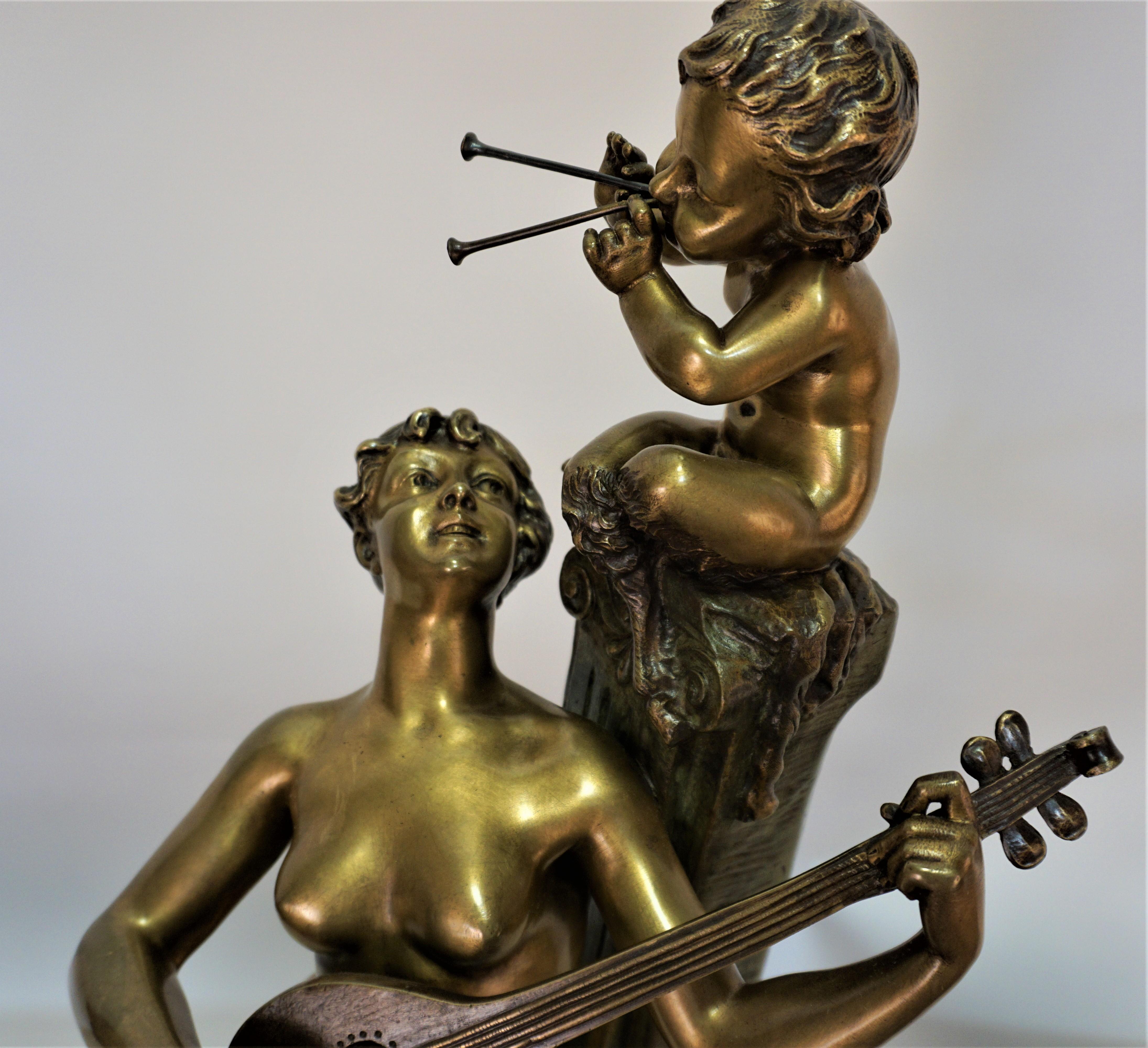 Début du 20ème siècle Bacchante plongeant la musique avec un jeune satyre en bronze par Aristide De Ranieri 1865-1929 en vente