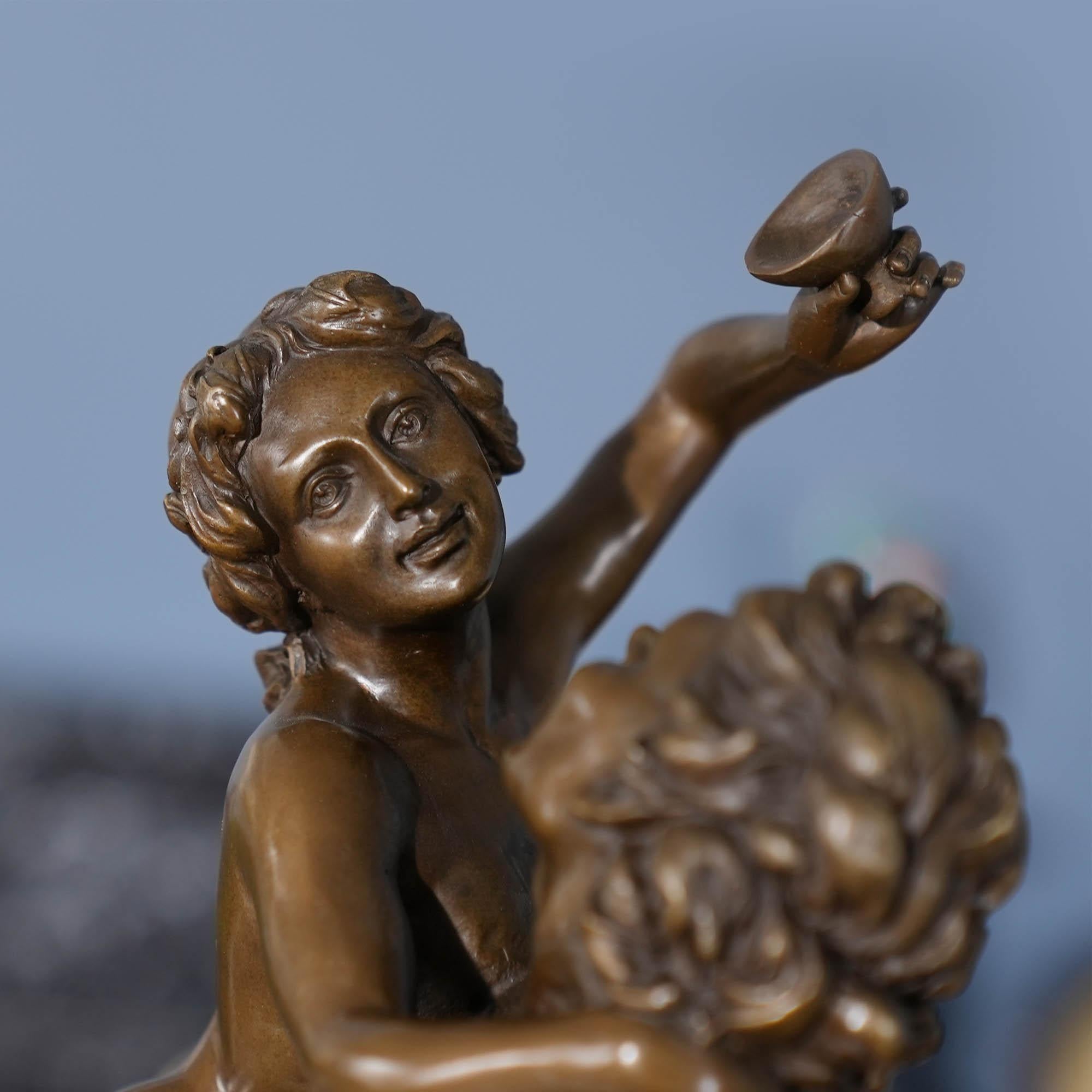 Bronze Bacchus avec femme sur base en marbre en vente