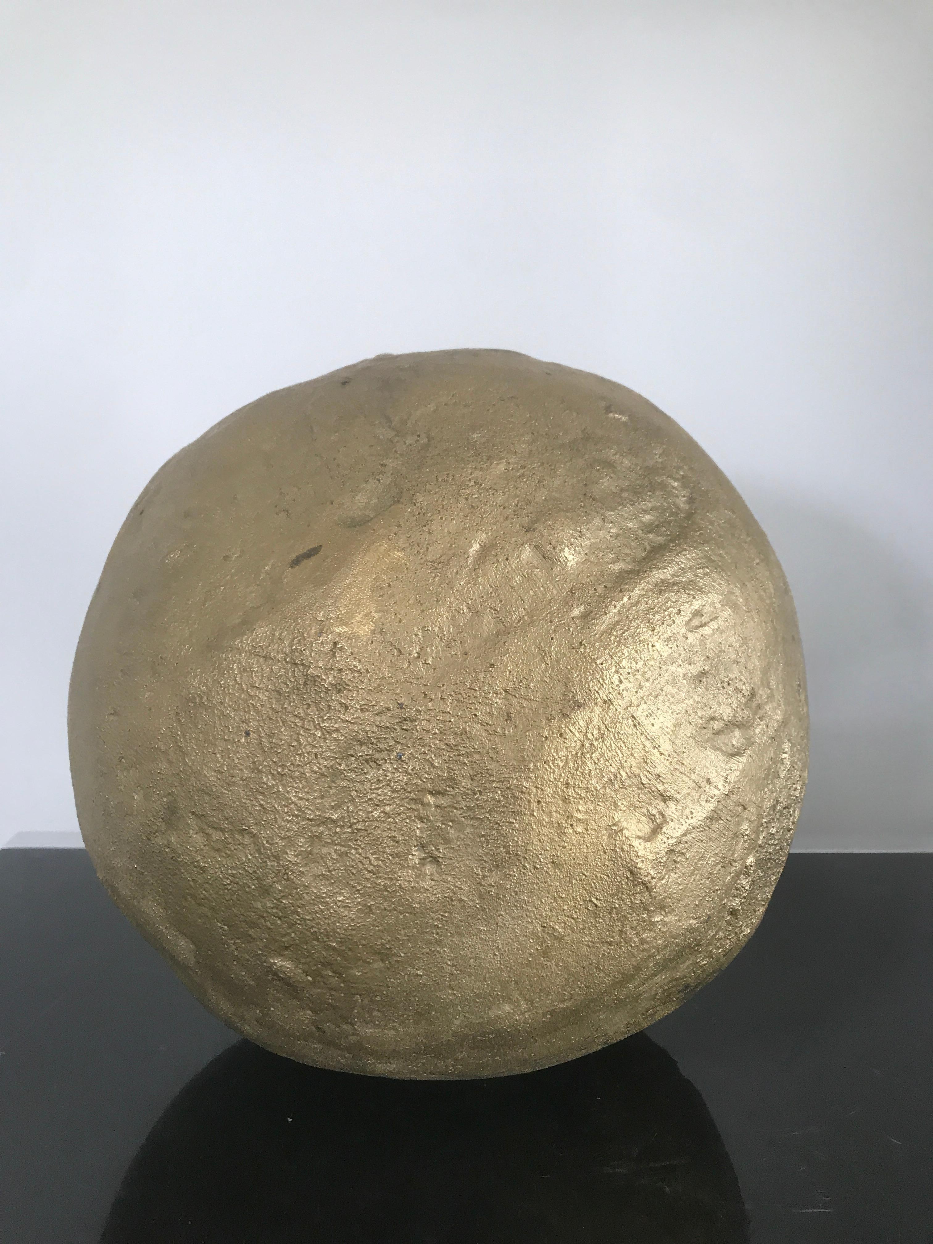 Cast iron bronze ball by Ado Chale.