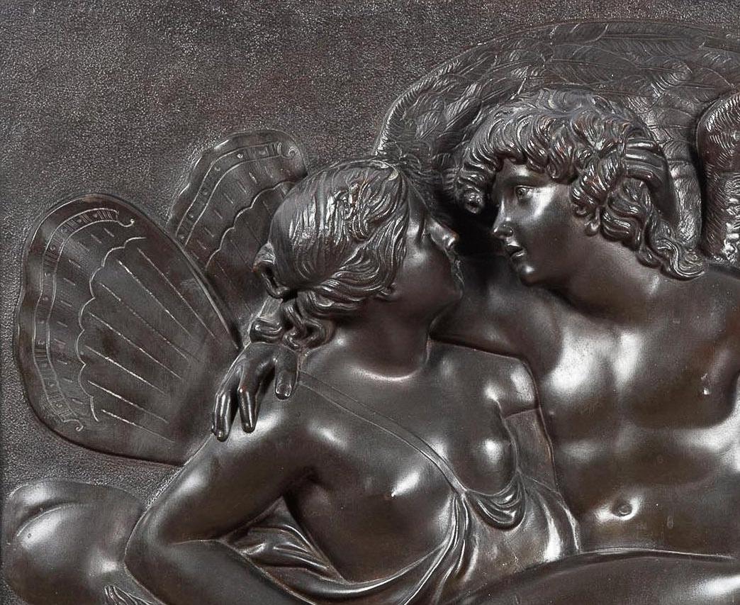 French 19th century patinated bronze bas relief plaque depicting cupid and psyche.