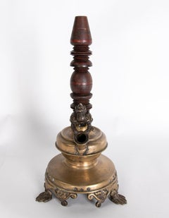 Base in bronzo con parte centrale in legno tornito per fumare