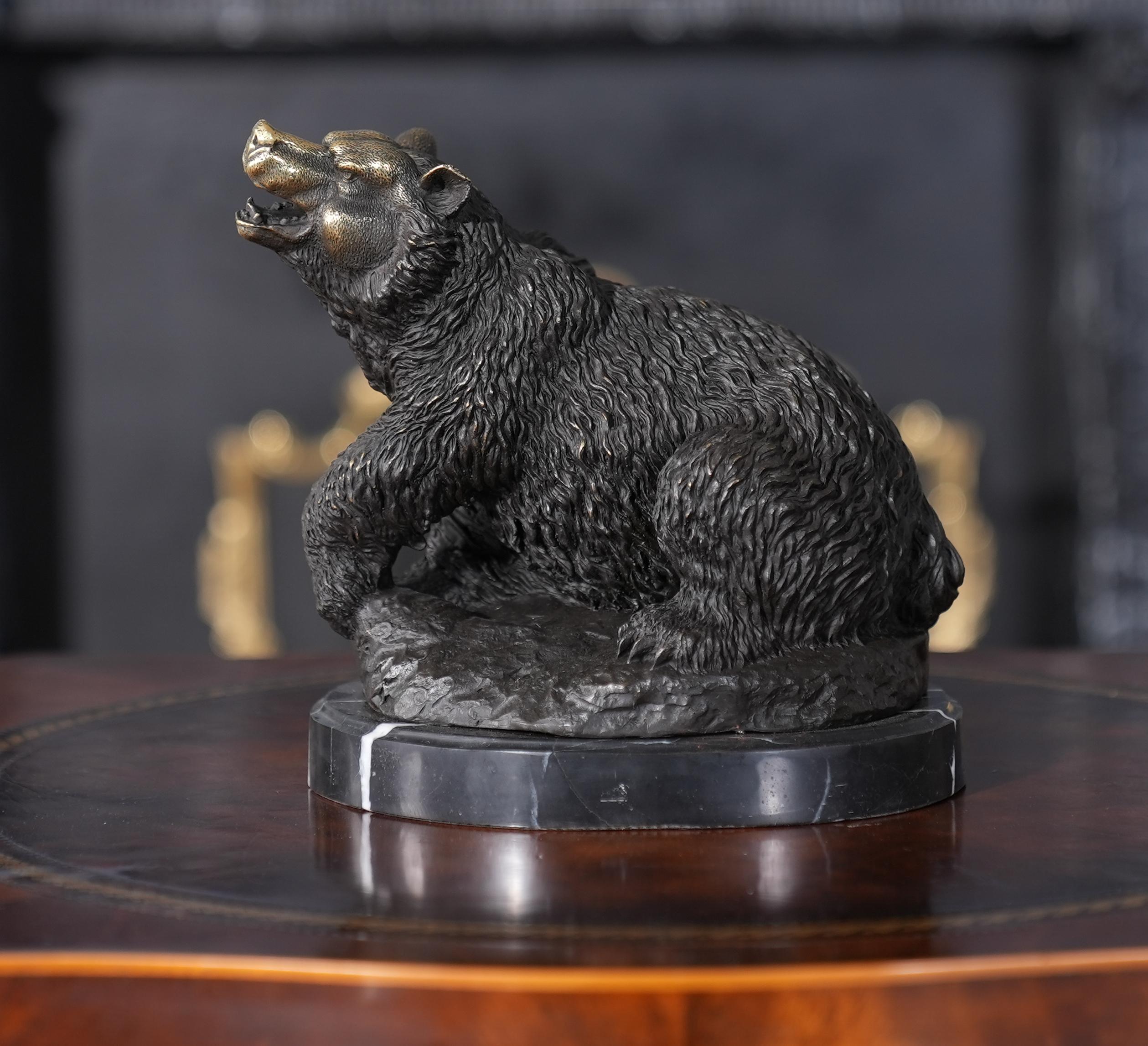 Fearsome even when standing still the Bronze Bear on Marble Base is a striking addition to any setting. Using traditional lost wax casting methods the Bronze Bear statue is created in pieces and then joined together with brazing and hand chaised