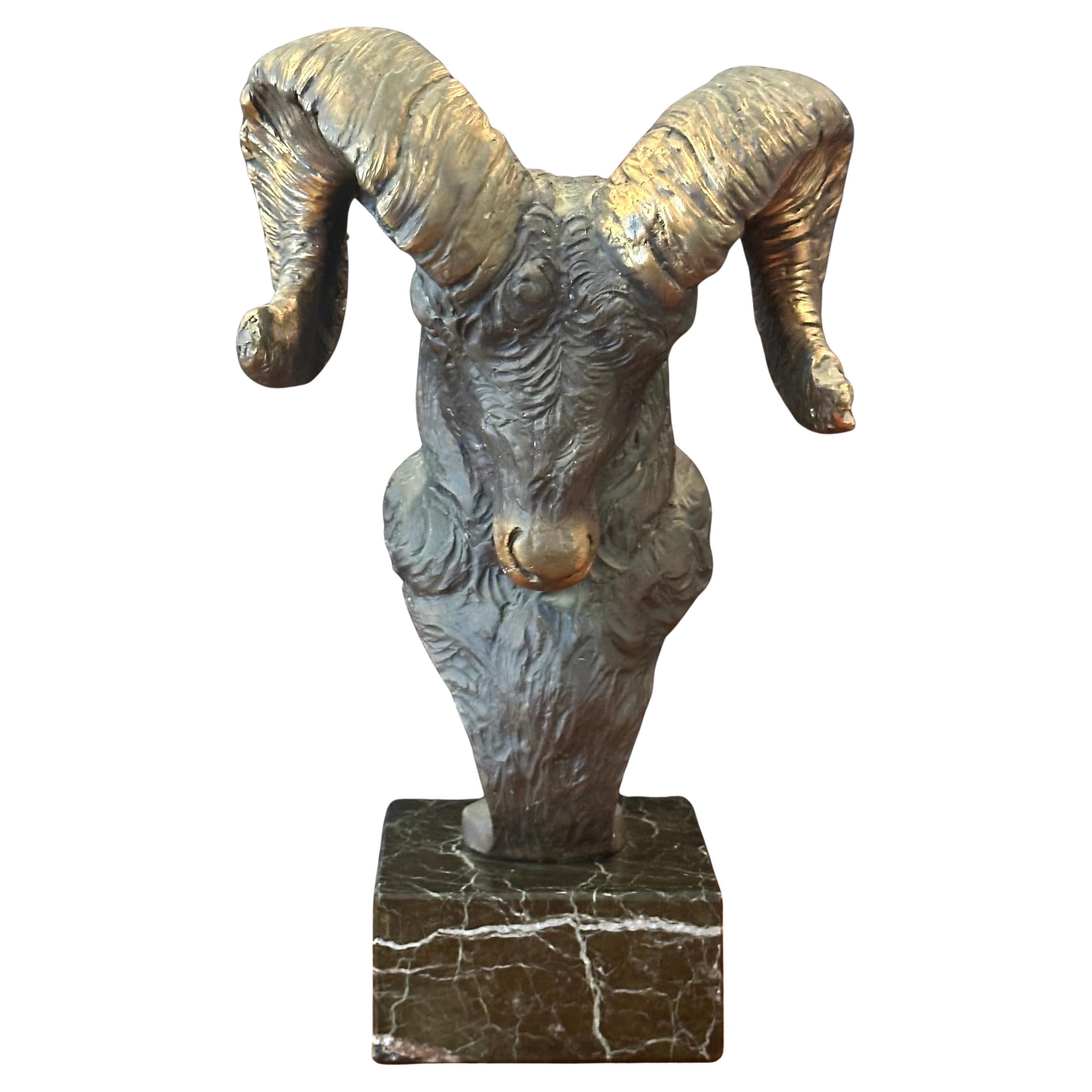 Beautiful bronze bighorn ram bust sculpture on black marble base entitled 