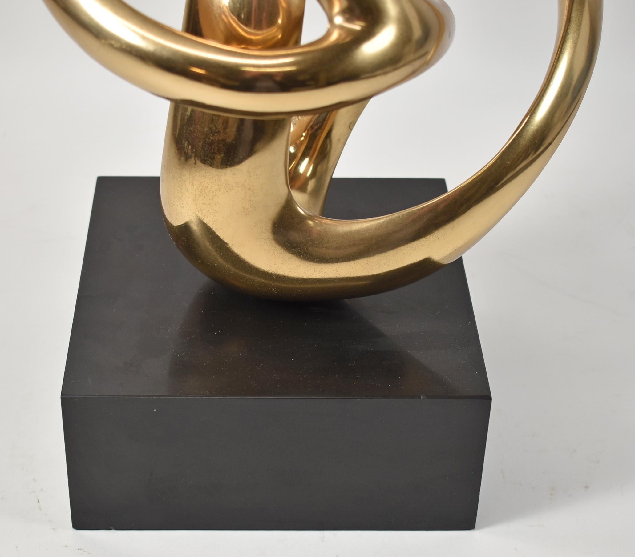 Bronze biomorphic sculpture by Antonio Grediaga Kieff. Circa 1985. Gold patina polished bronze sculpture from the folklore series by Kieff. Numbered 3 from the edition of 9, with signature by the artist on a 3