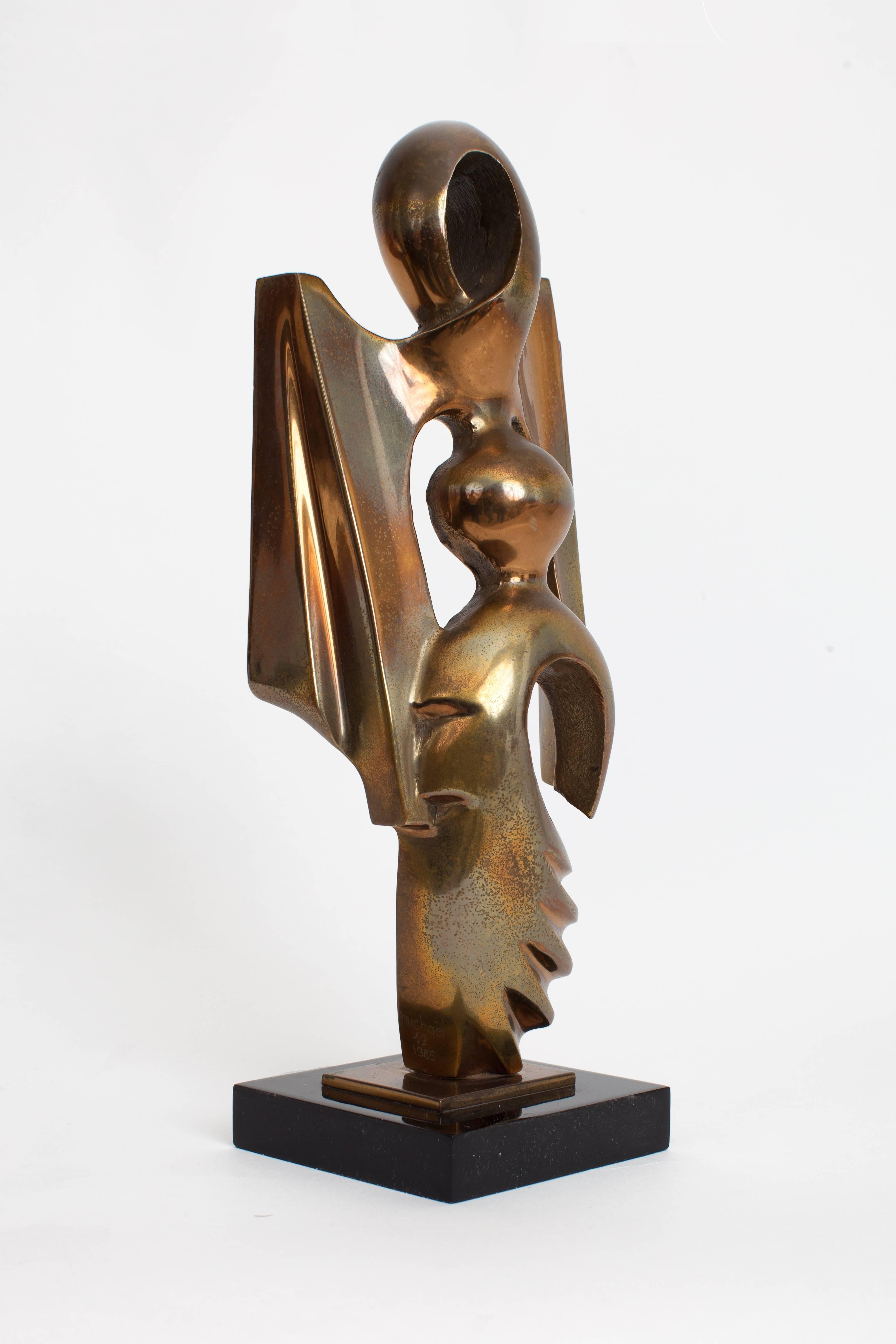 France, 1980s

Biomorphic, organic modern bronze sculpture of an abstracted female form raised on a black marble base. With a deep, variegated patina. 

Signed and dated: Michaël, 1985.